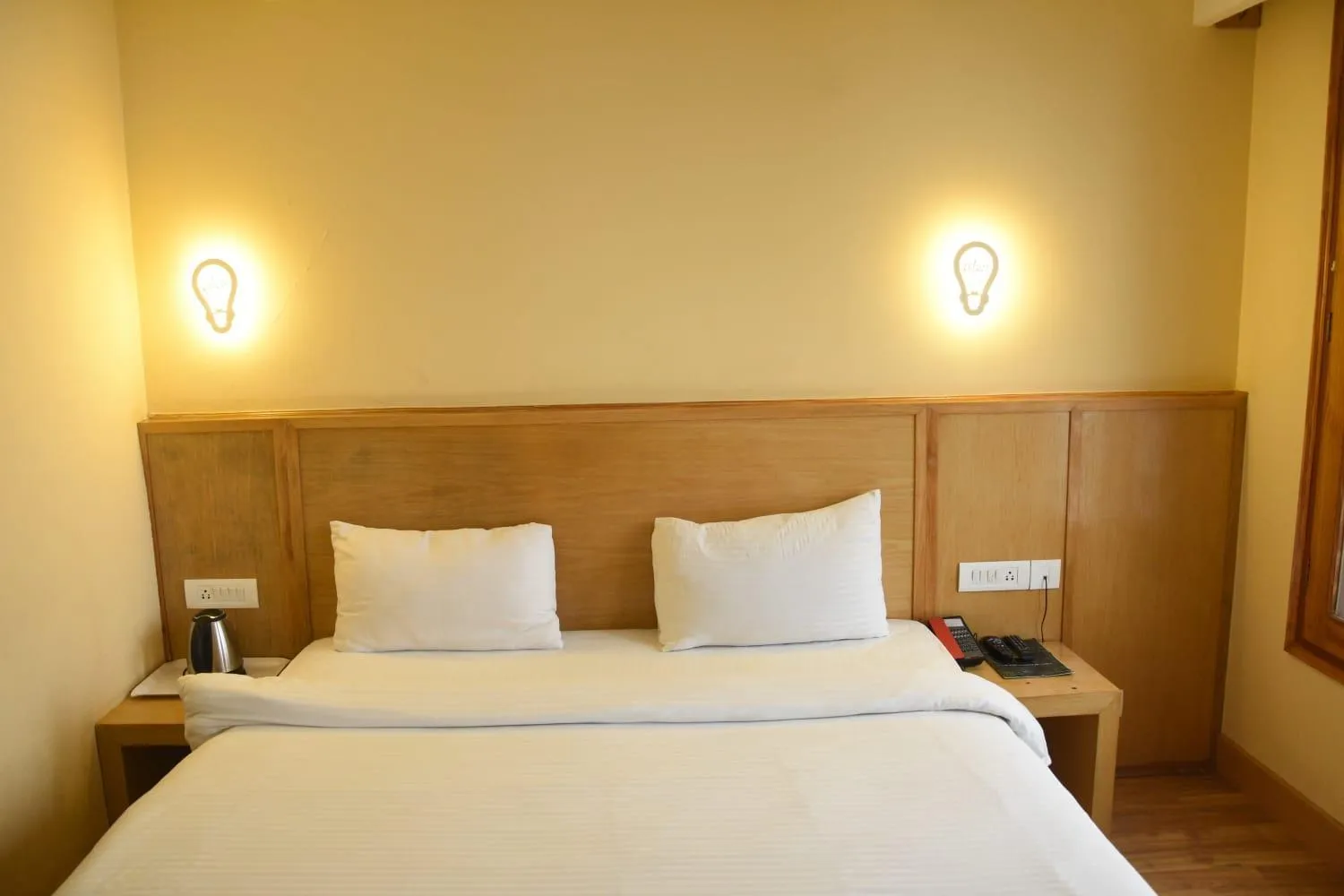 Bed in The Byke Nature Vilas Pure Veg