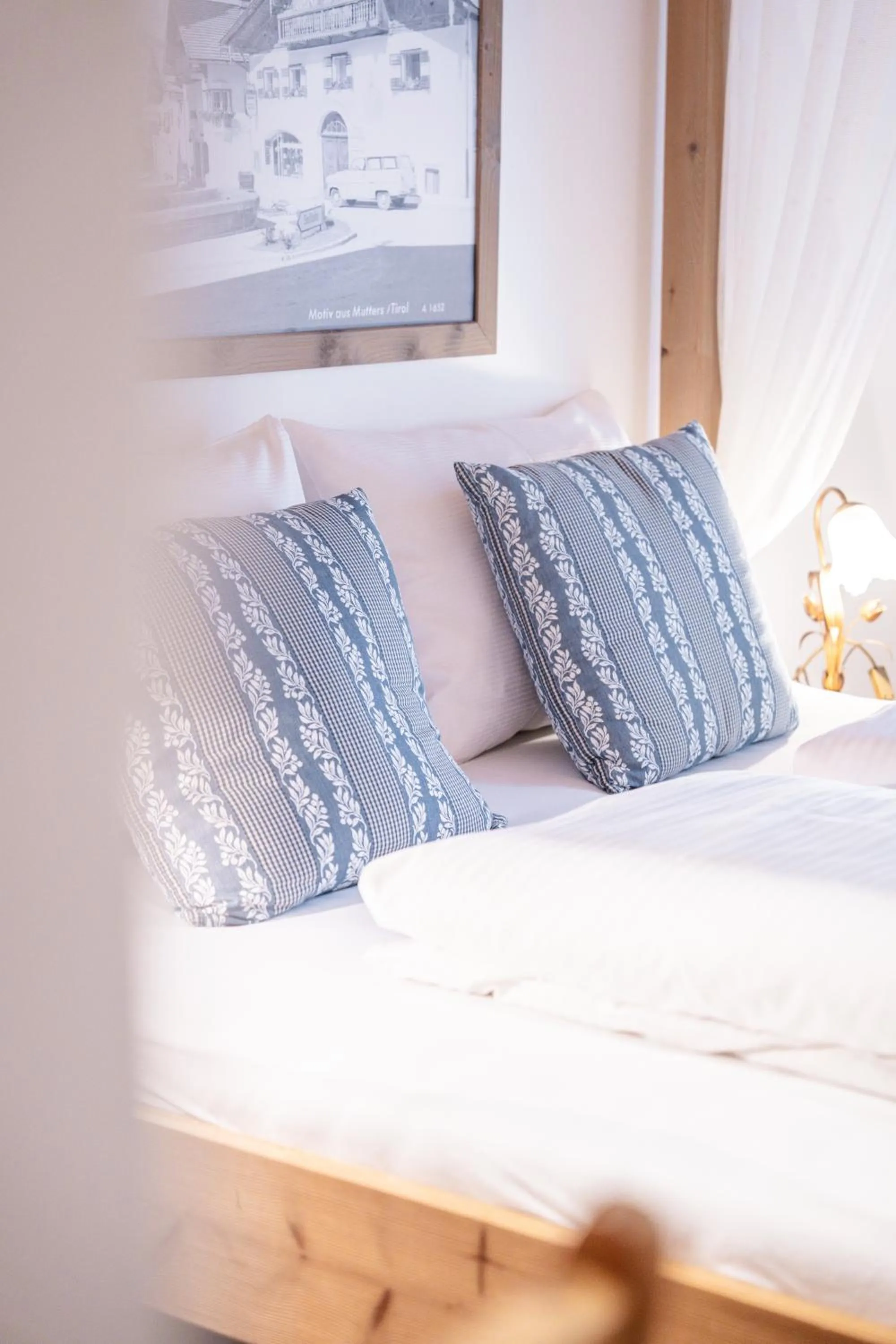 Bed in Stauders Zimmer und Ferienwohnungen