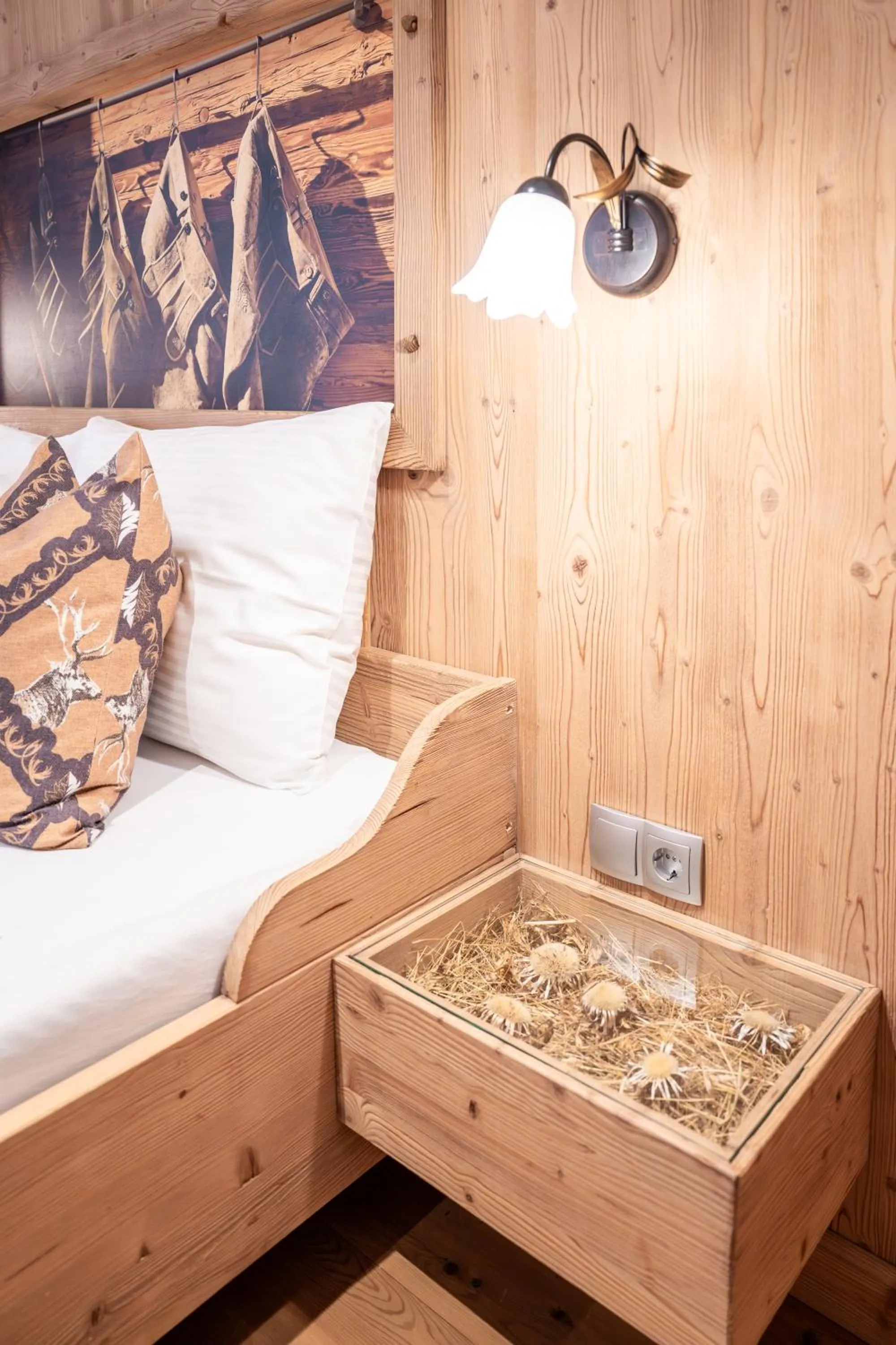 Bed in Stauders Zimmer und Ferienwohnungen