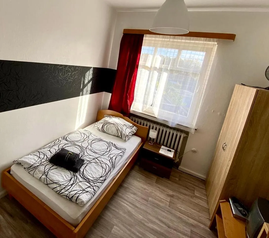 Bed in Pension Zum Burggrafen