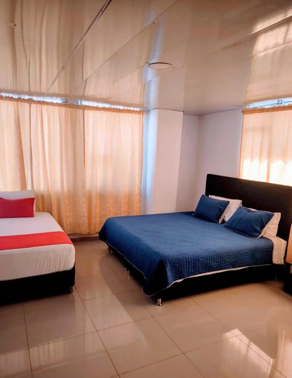 Bed in Hotel Cafe Plaza