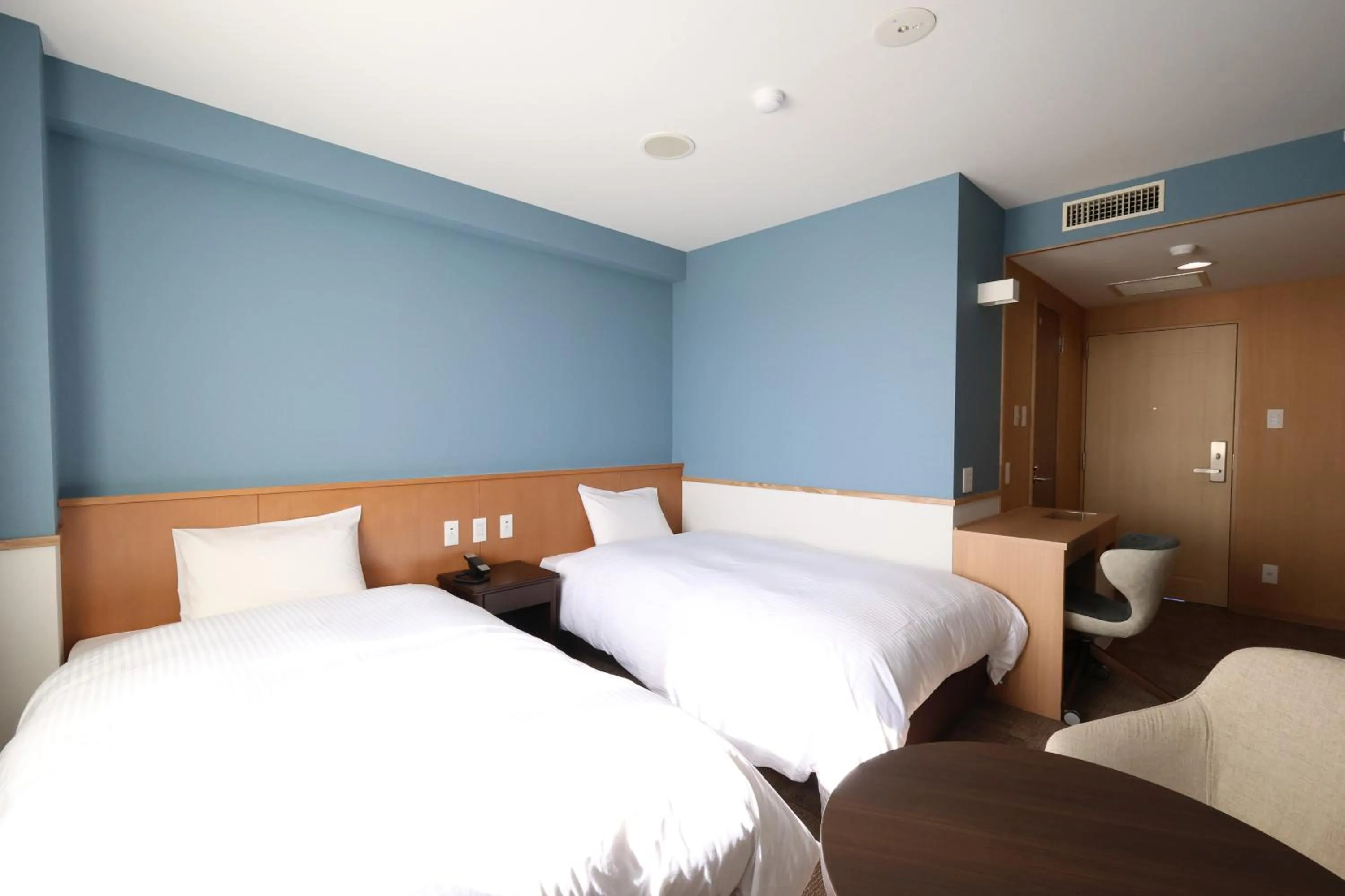 Bed in Kojohama Onsen Hotel