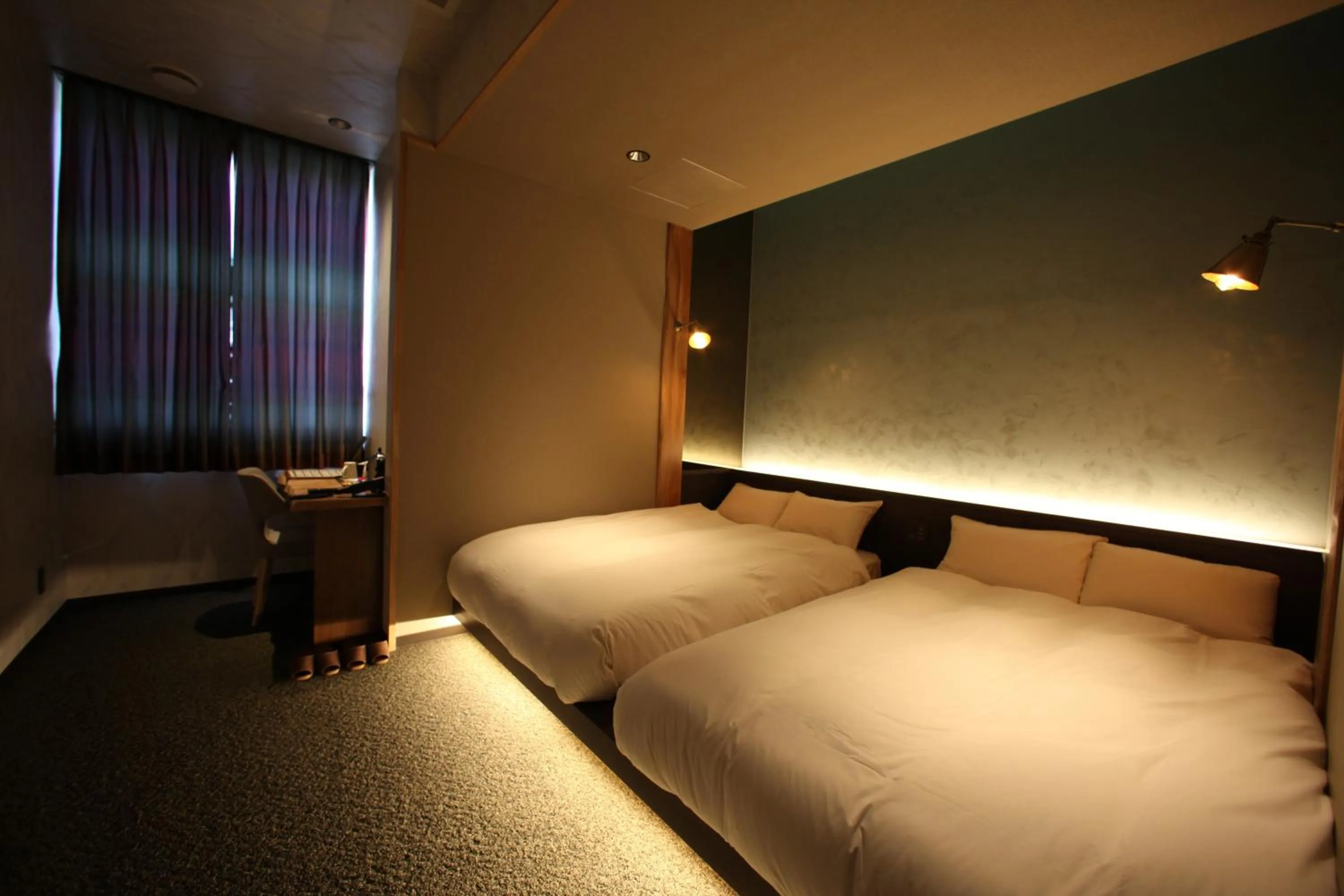 Bed in Kojohama Onsen Hotel