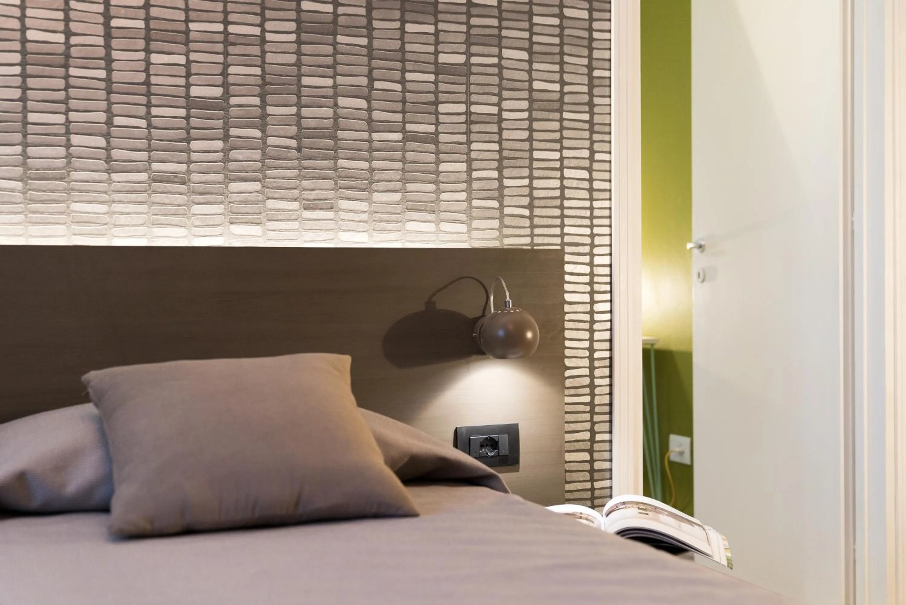 Decorative detail, Bed in Hotel La Diga Altomincio