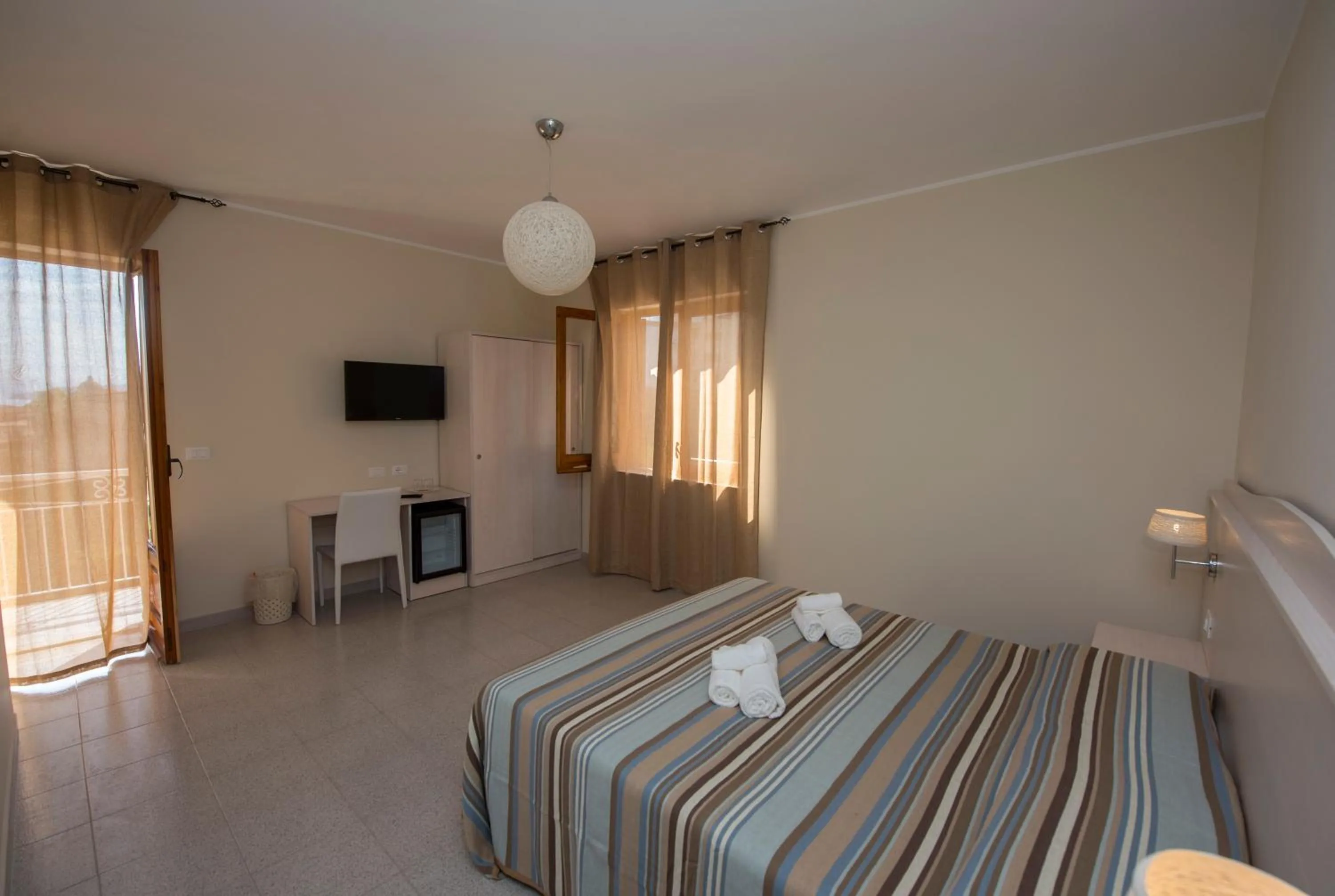 Photo of the whole room, Bed in Donna Rosa Accommodation