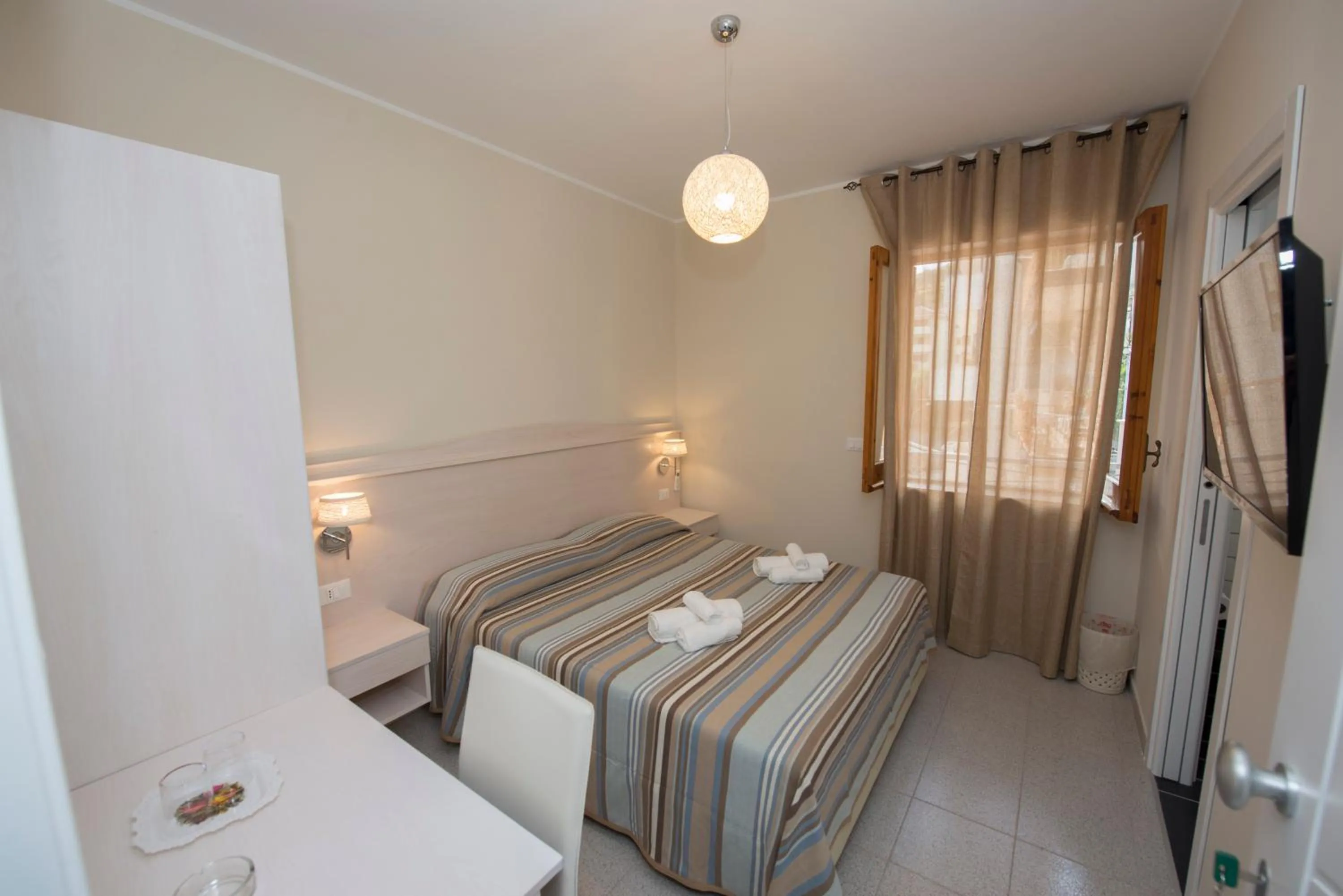 Photo of the whole room, Bed in Donna Rosa Accommodation