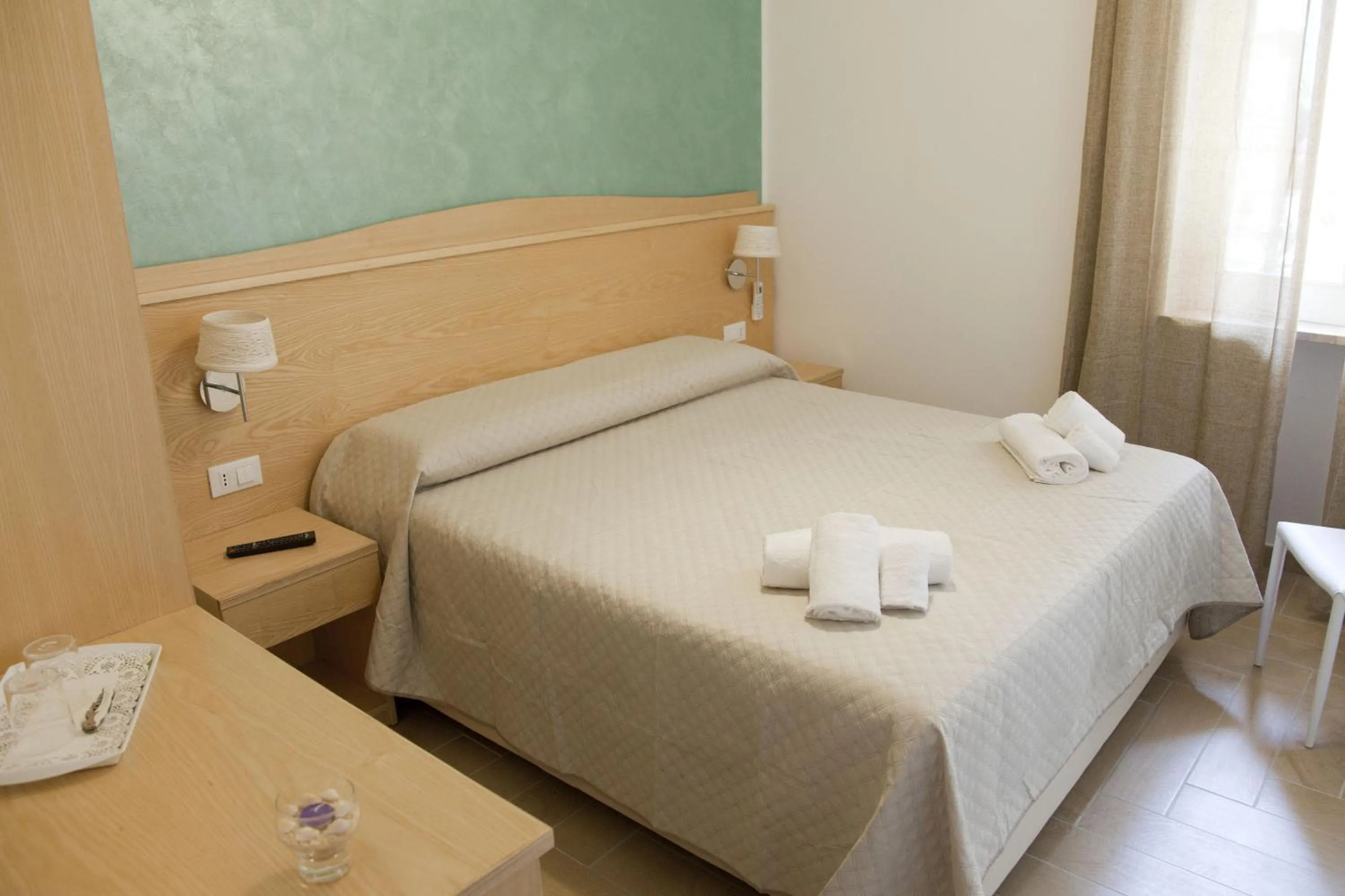 Bed in Donna Rosa Accommodation