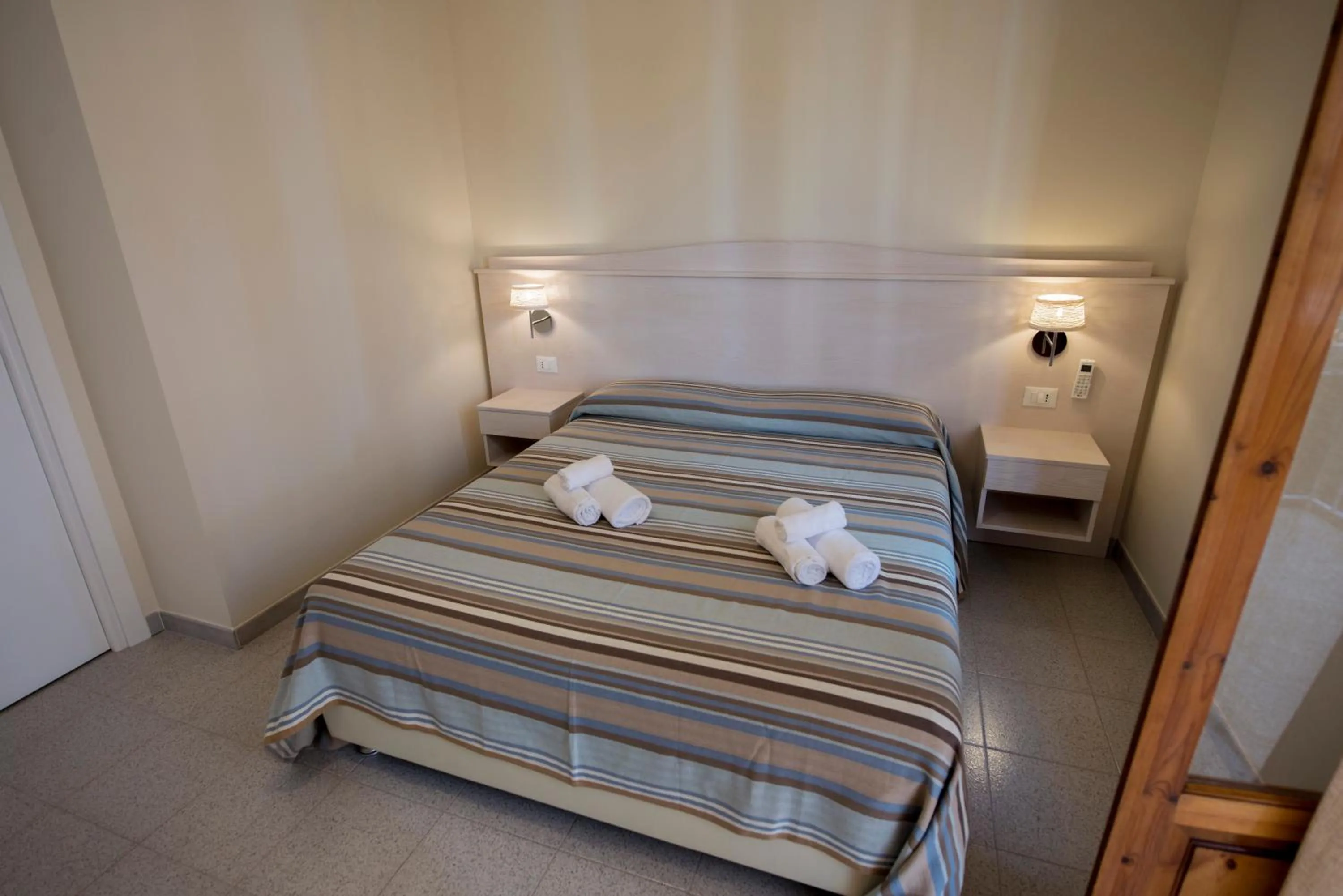 Photo of the whole room, Bed in Donna Rosa Accommodation