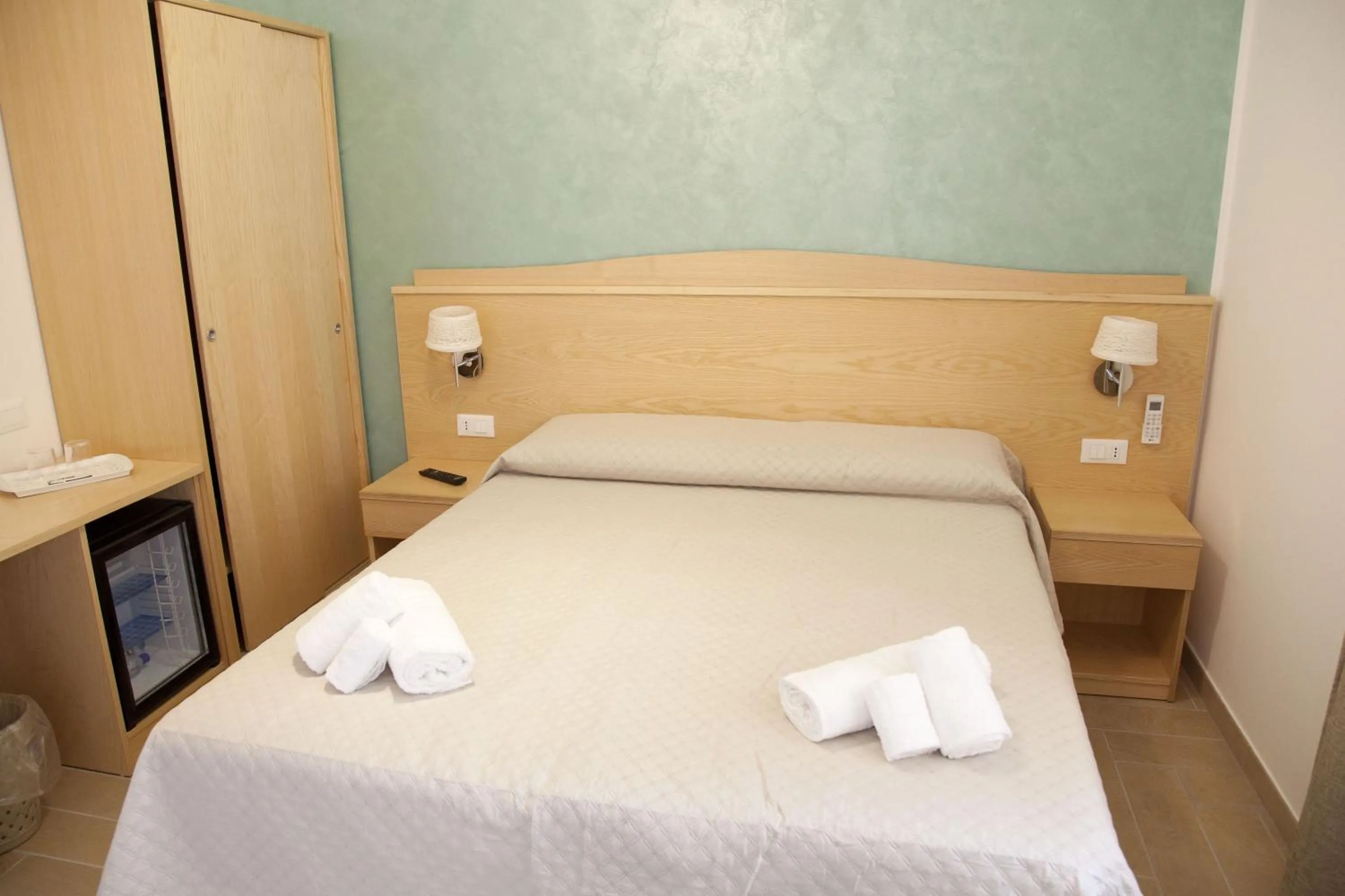 Photo of the whole room, Bed in Donna Rosa Accommodation