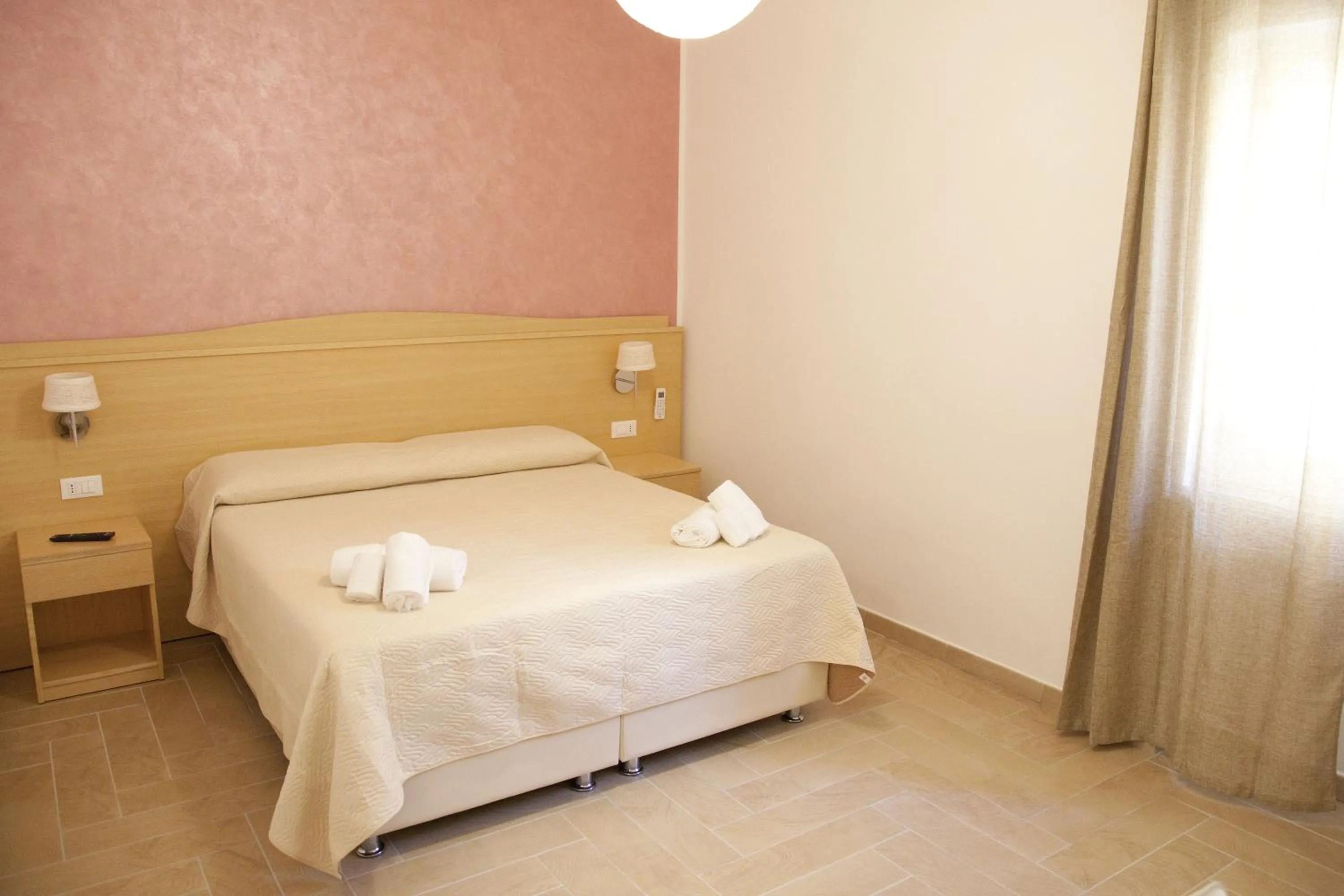 Bed in Donna Rosa Accommodation