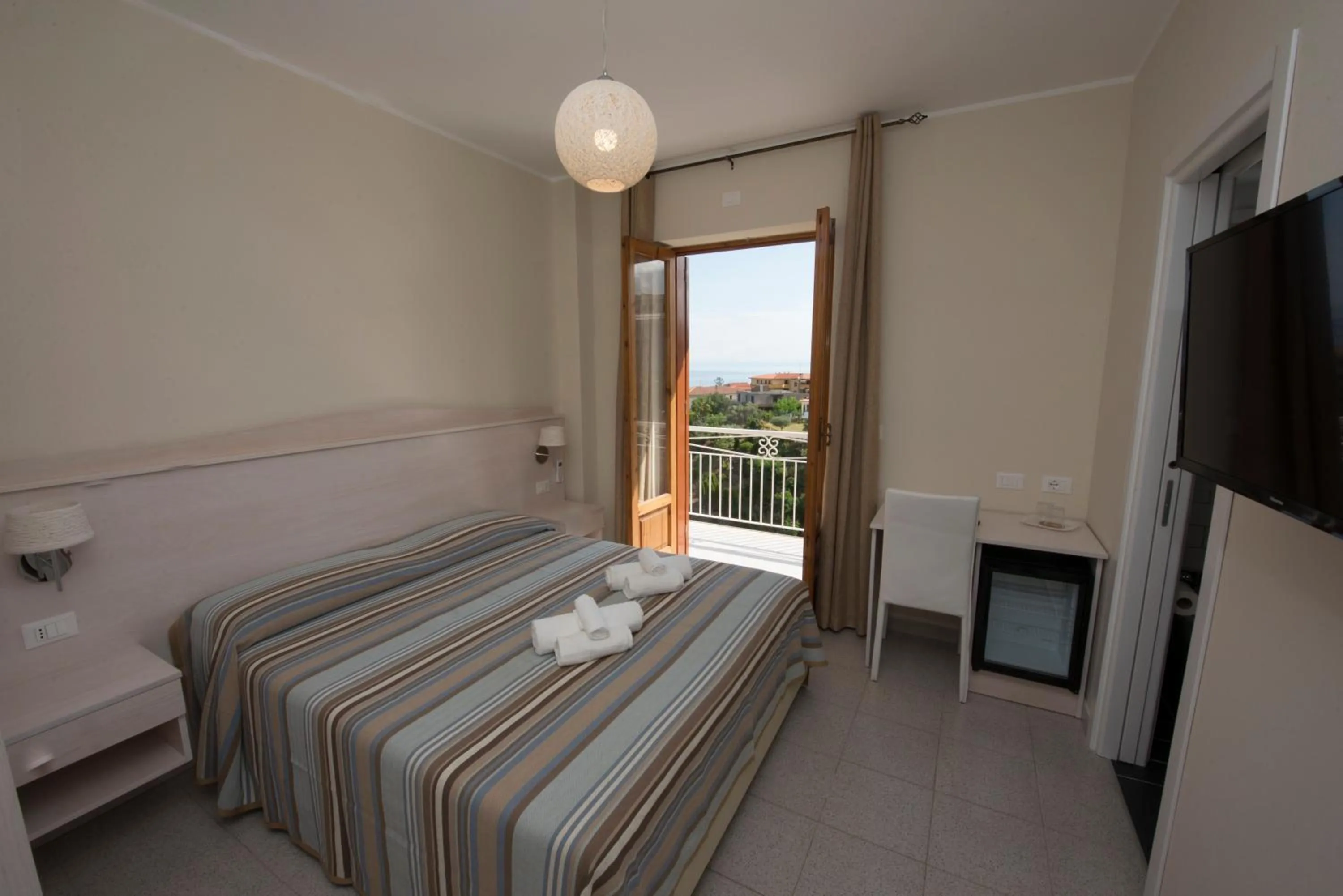 Photo of the whole room, Bed in Donna Rosa Accommodation