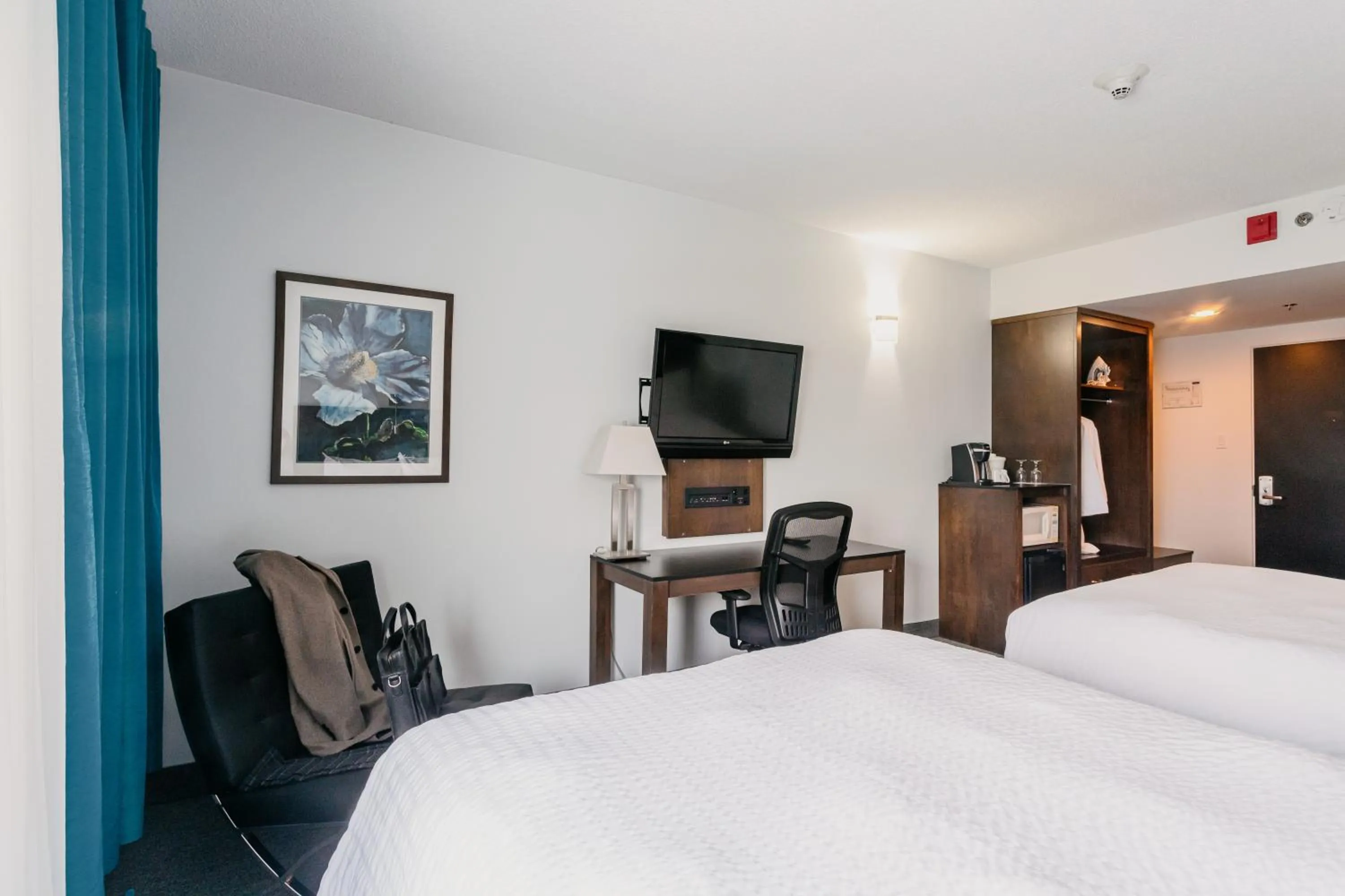 Photo of the whole room, Bed in Riotel Matane