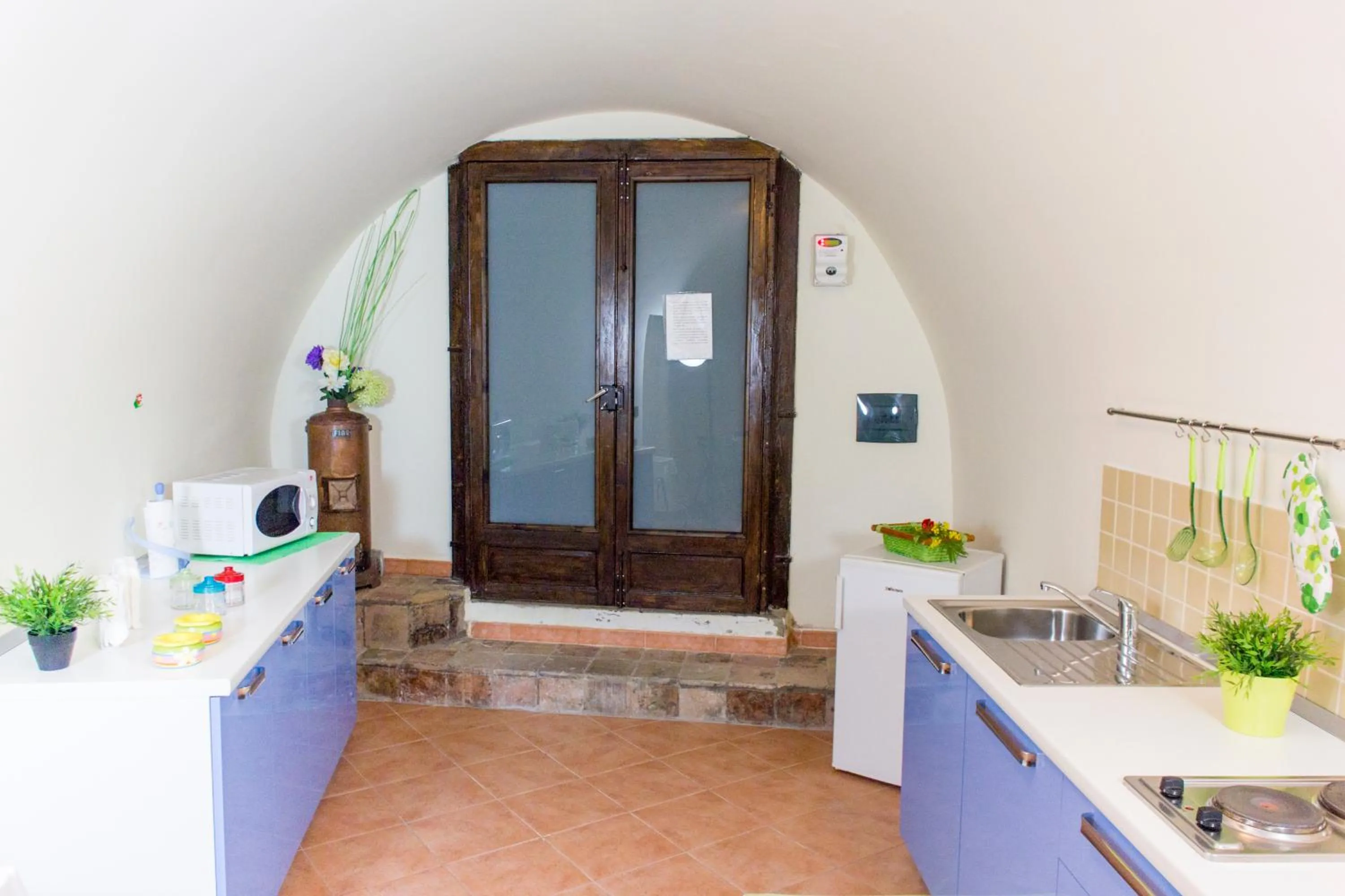 Communal kitchen in Le Stanze Dell'Imperatore B&B