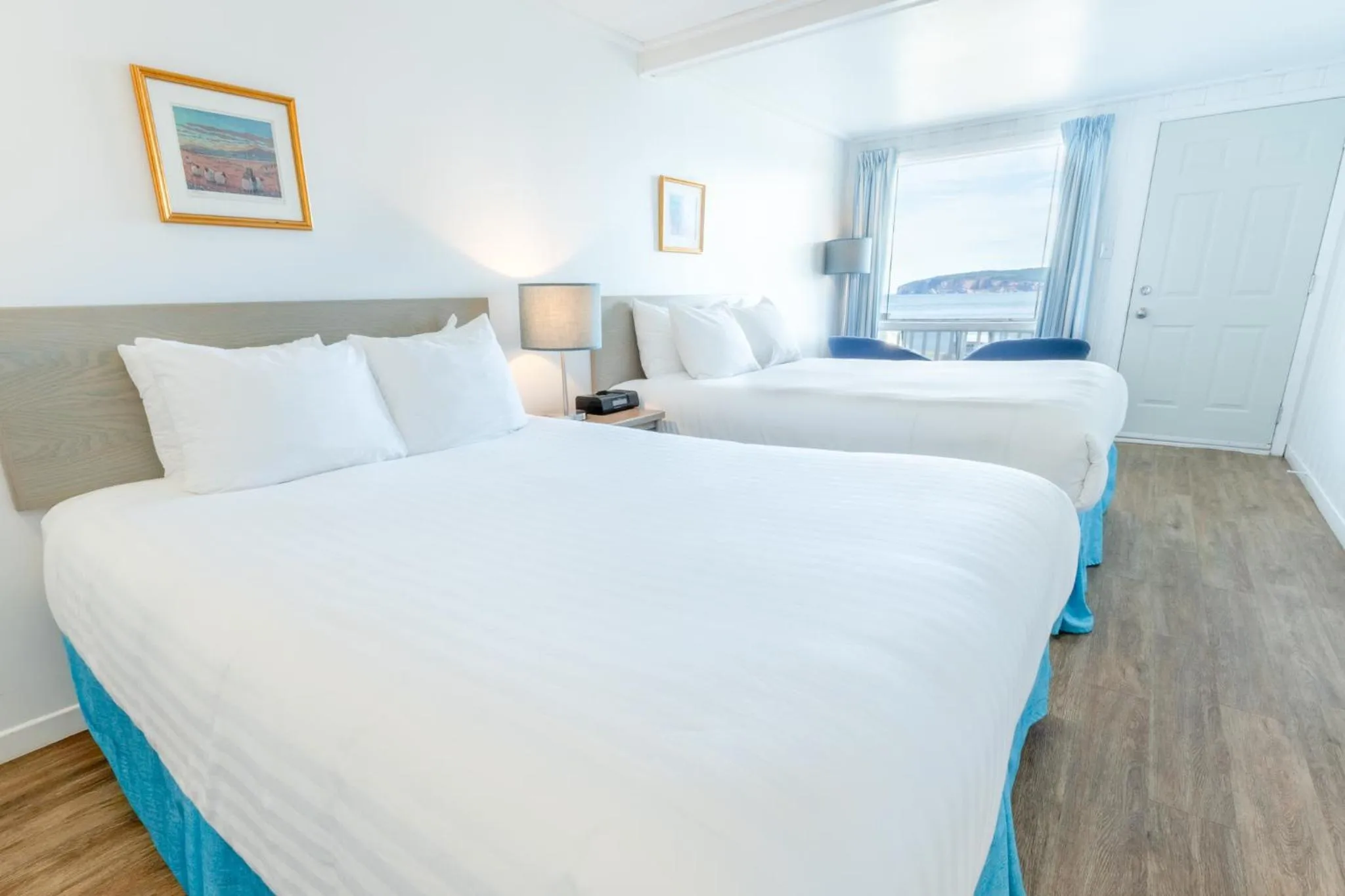 Photo of the whole room, Bed in Riotel Perce