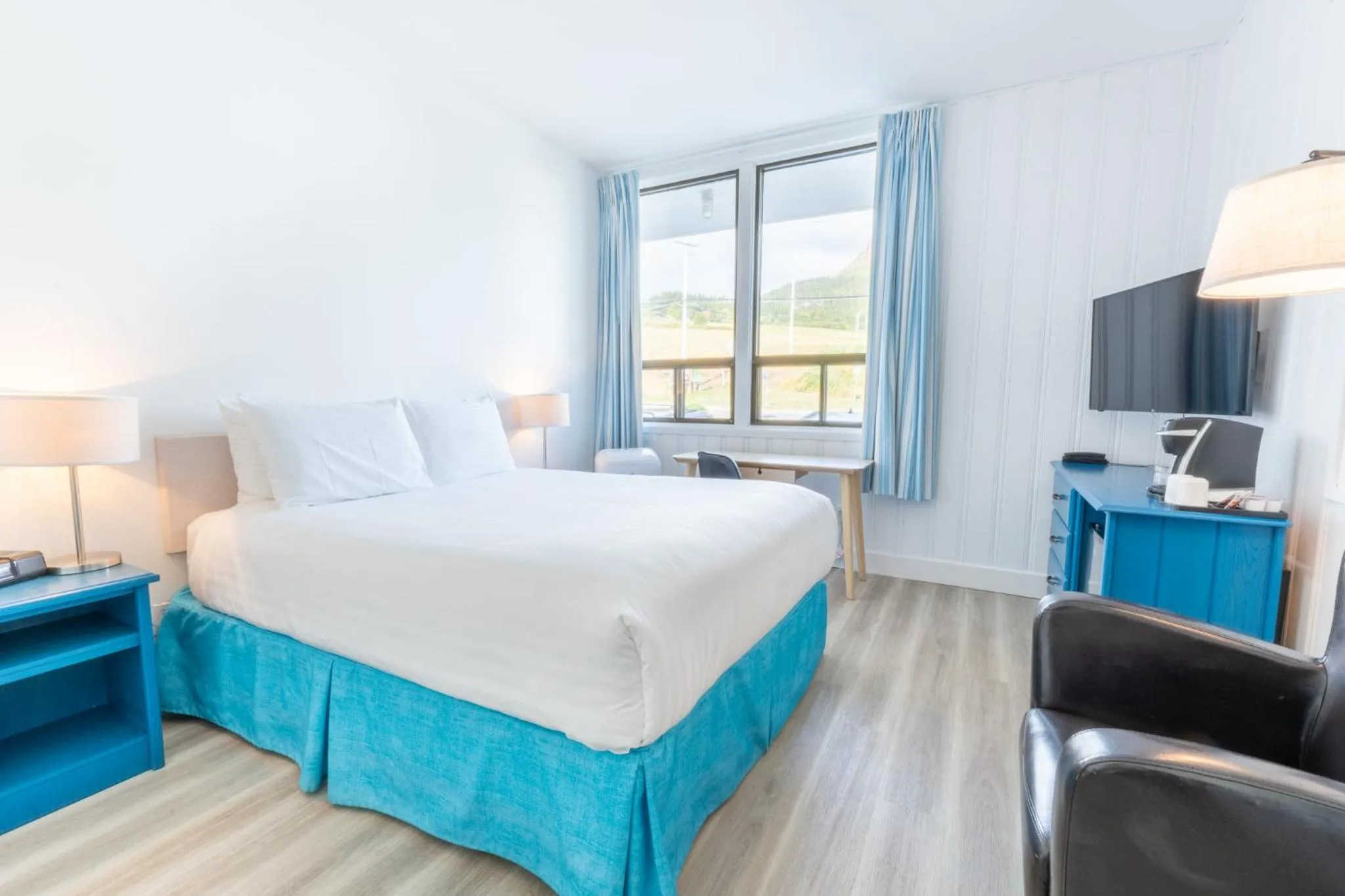 Photo of the whole room, Bed in Riotel Perce