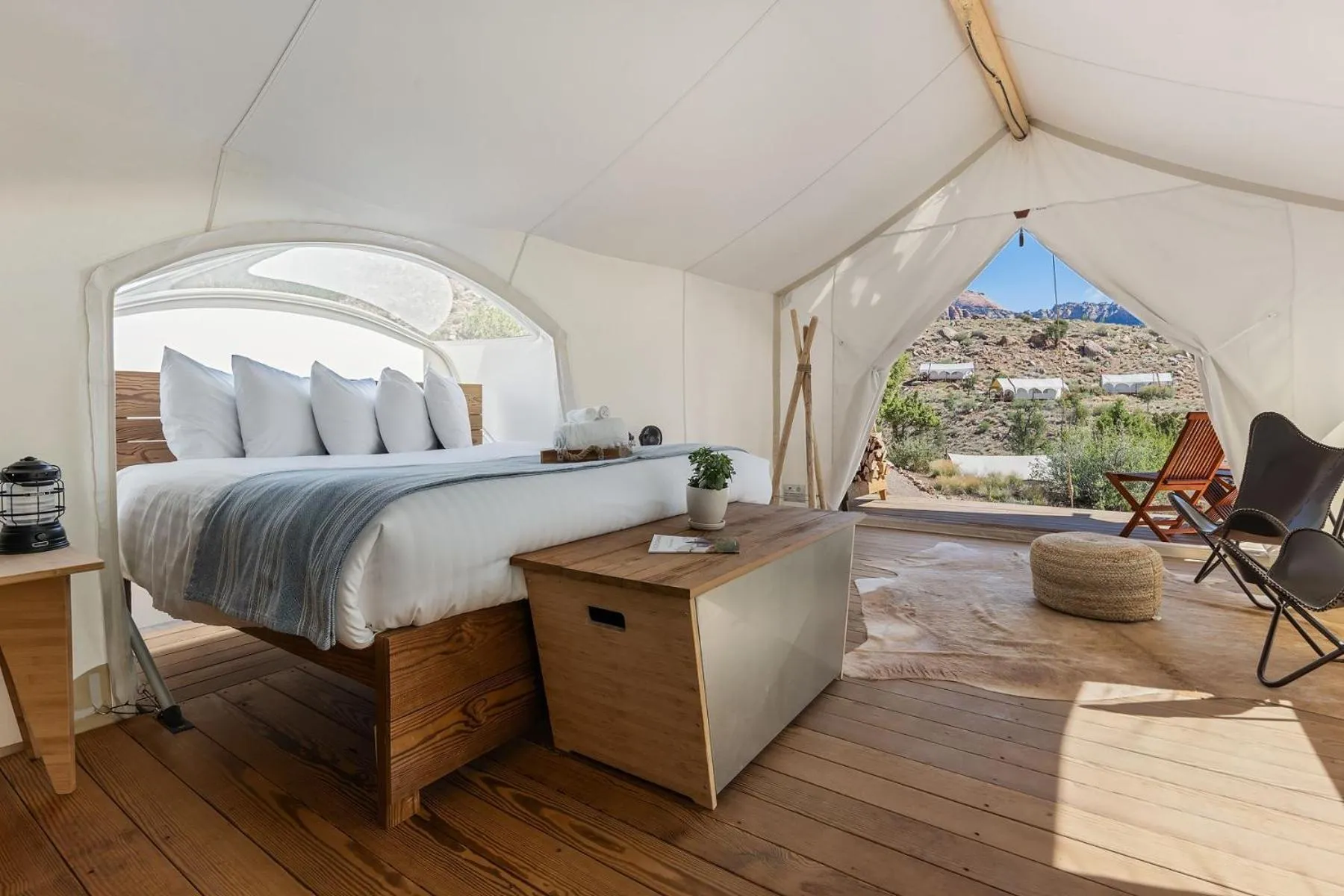 Seating area, Bed in Under Canvas Zion