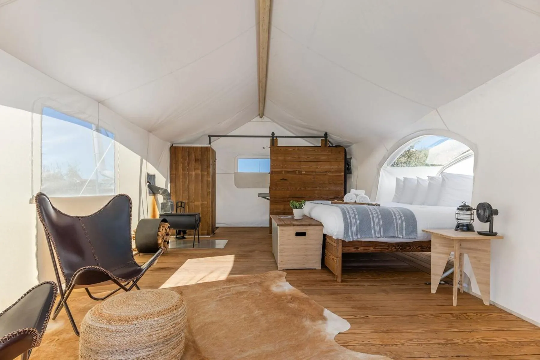 Photo of the whole room, Bed in Under Canvas Zion