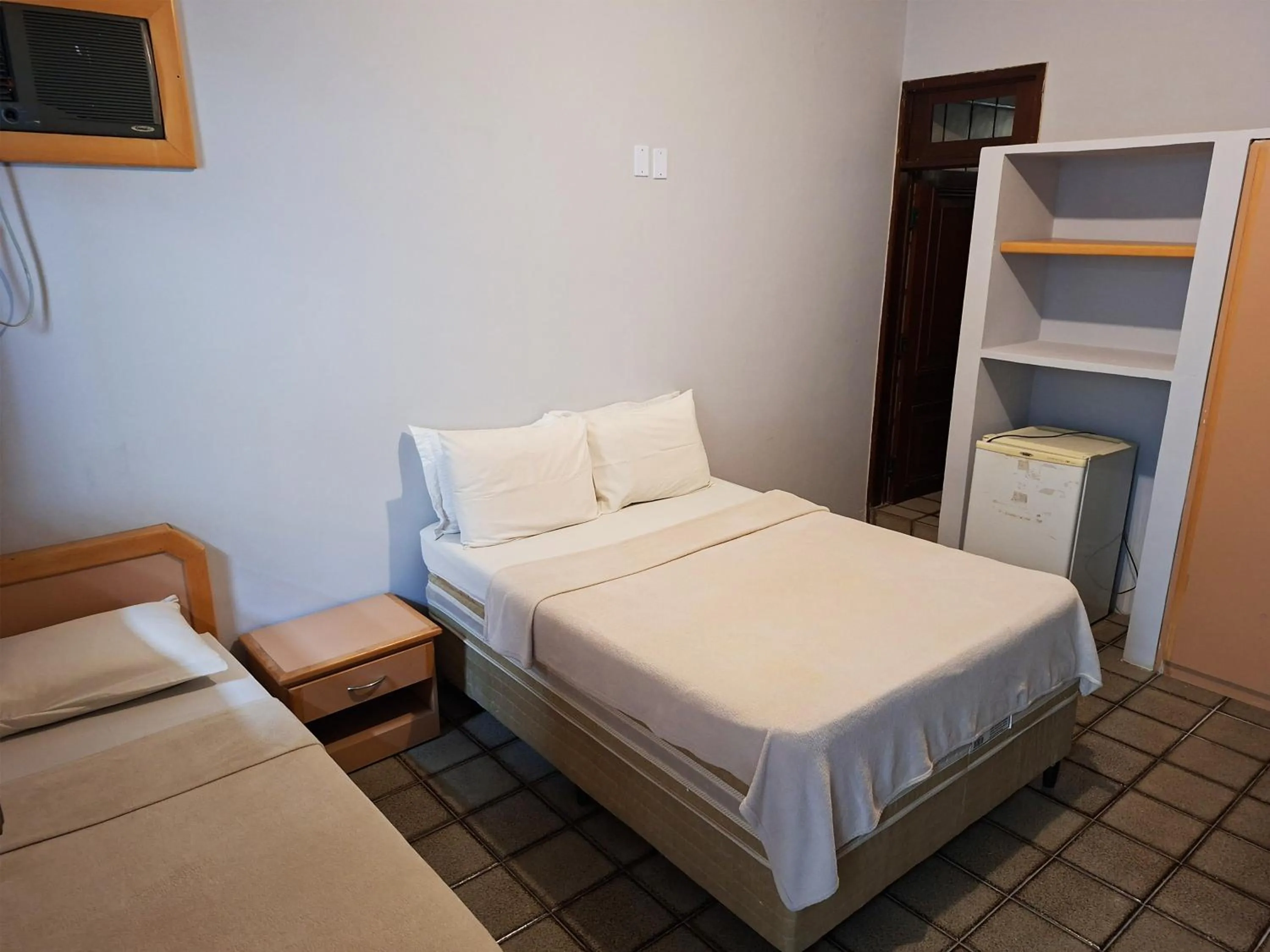 Bed in Pousada Casa Grande