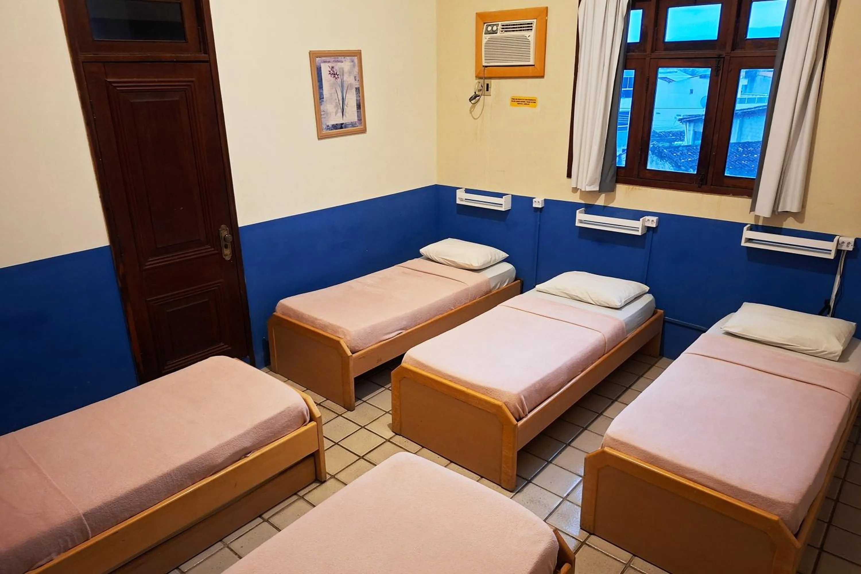 Bed in Pousada Casa Grande