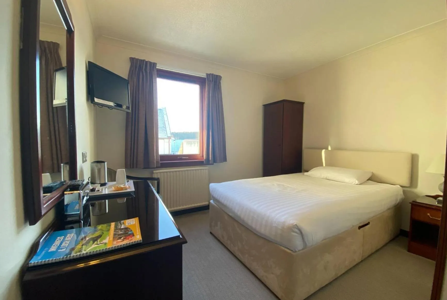 Bed in The Priory Hotel