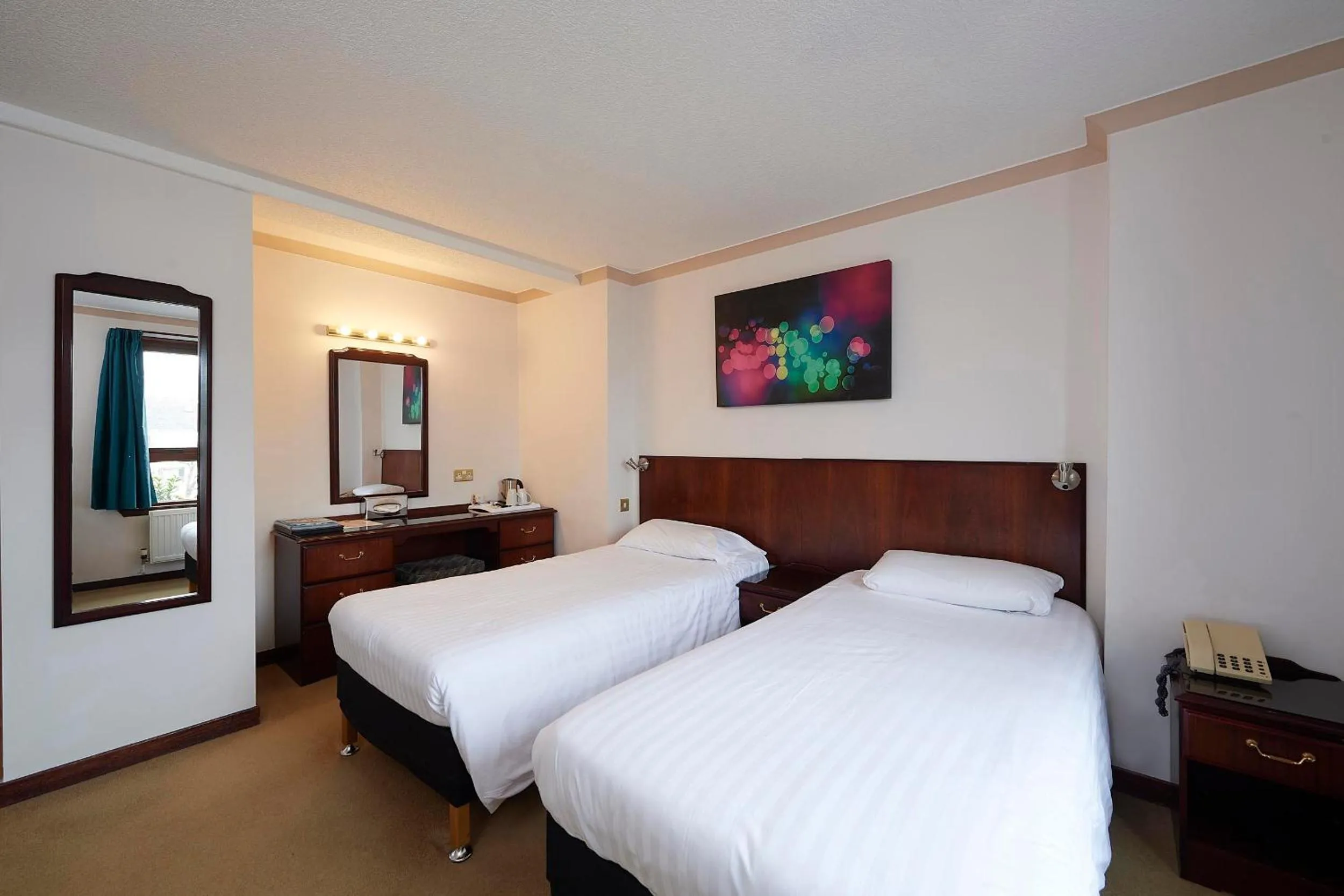 Bed in The Priory Hotel