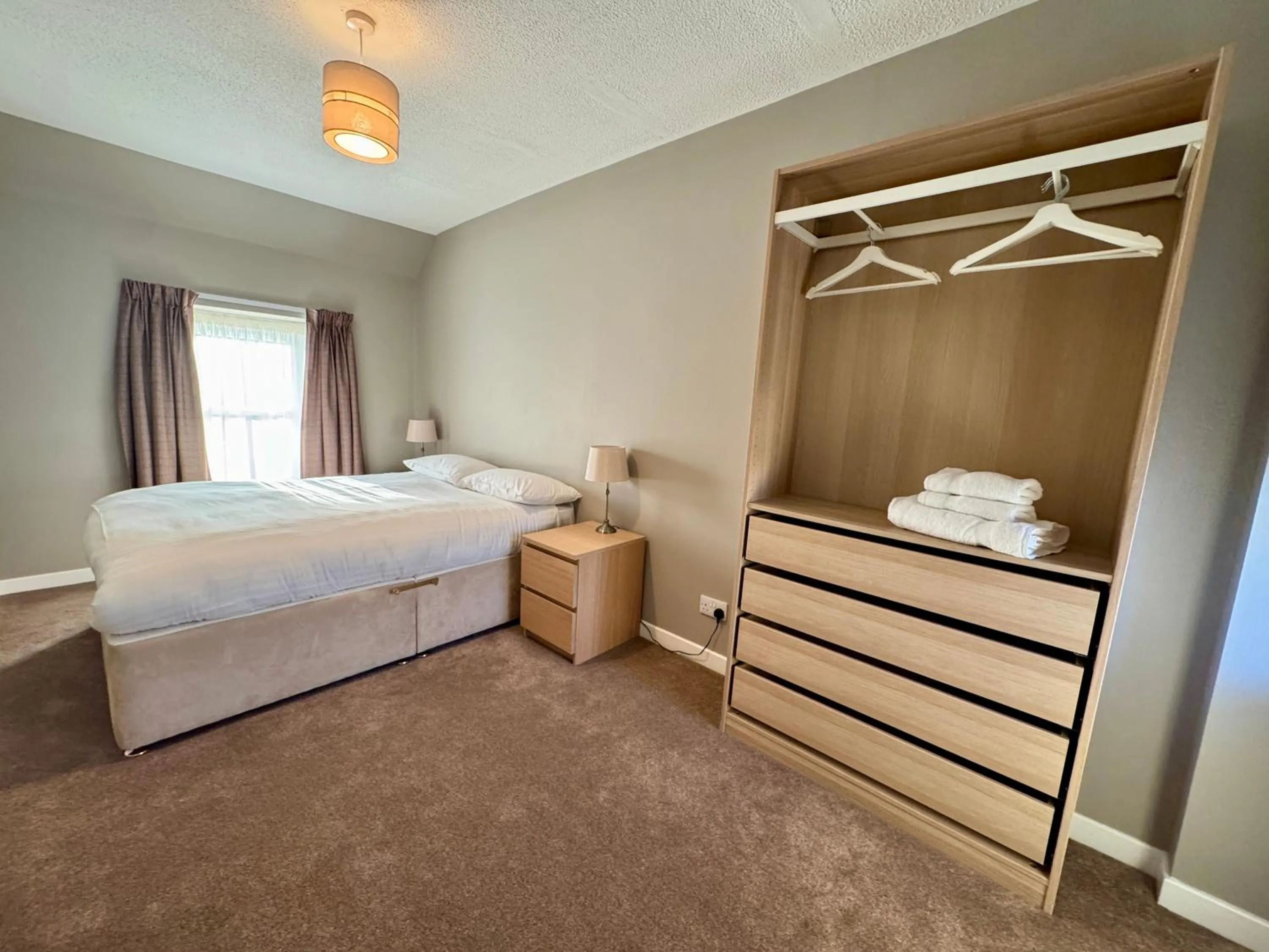 Bed in The Priory Hotel