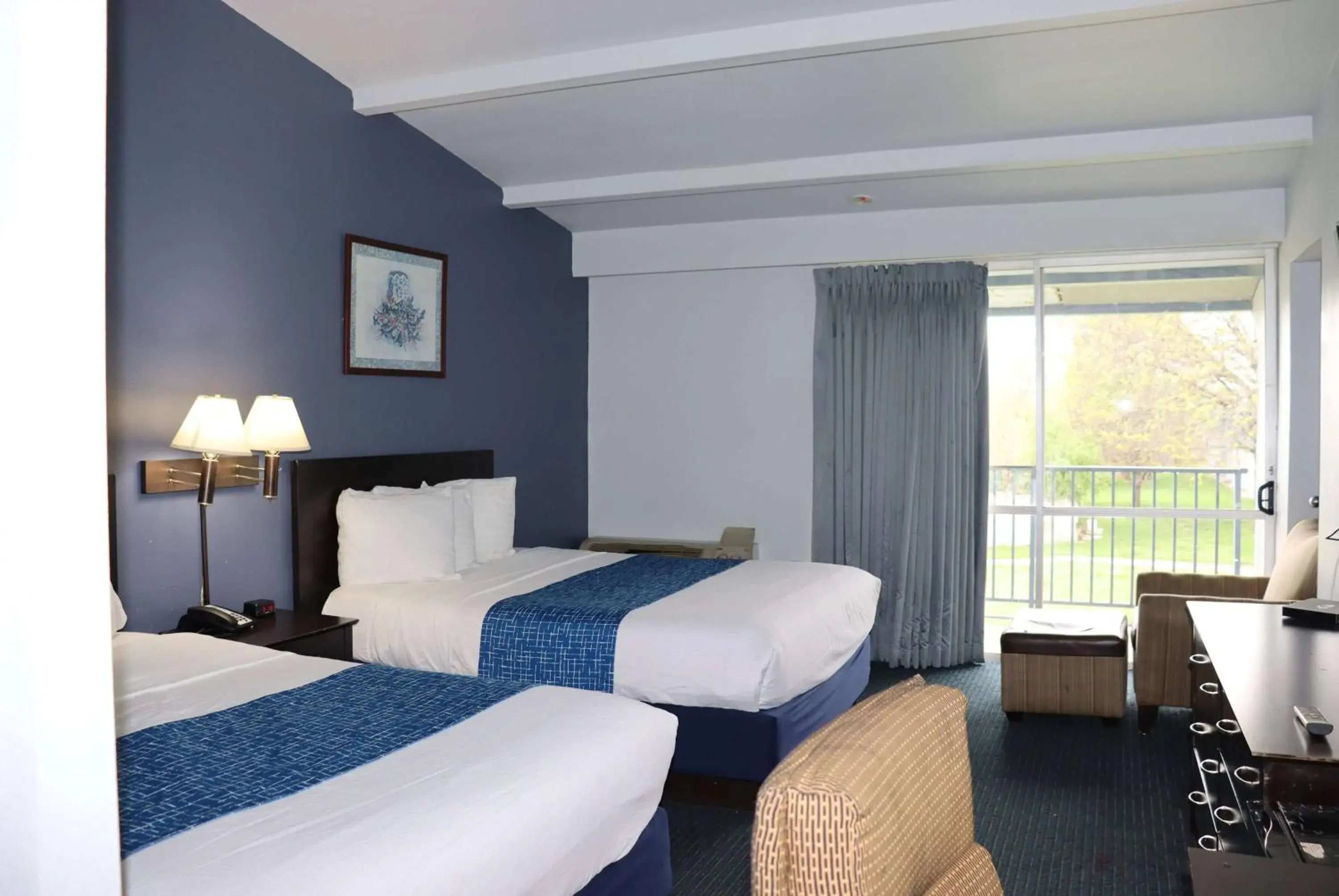 Queen Room with Two Queen Beds - Pet Friendly/Non-Smoking in Travelodge by Wyndham Milwaukee Queen Room with Two Queen Beds - Pet Friendly/Non-Smoking in Travelodge by Wyndham Milwaukee
