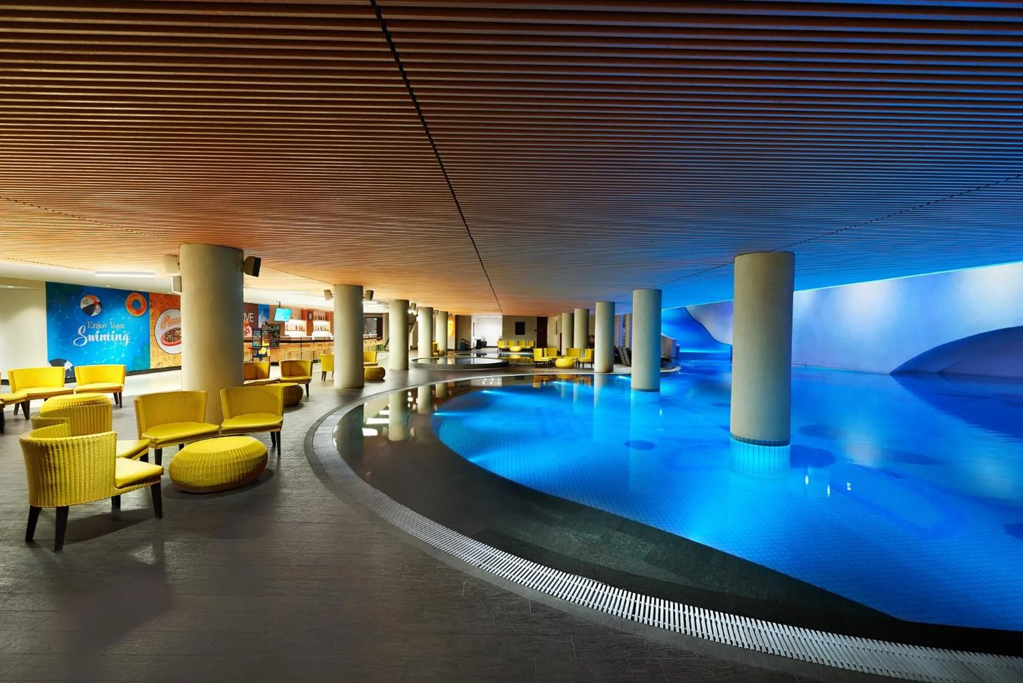 Swimming pool in Golden Tulip Holland Resort Batu