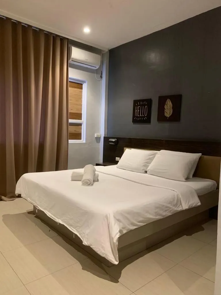 Bed in LEUX Hotel Alona Panglao