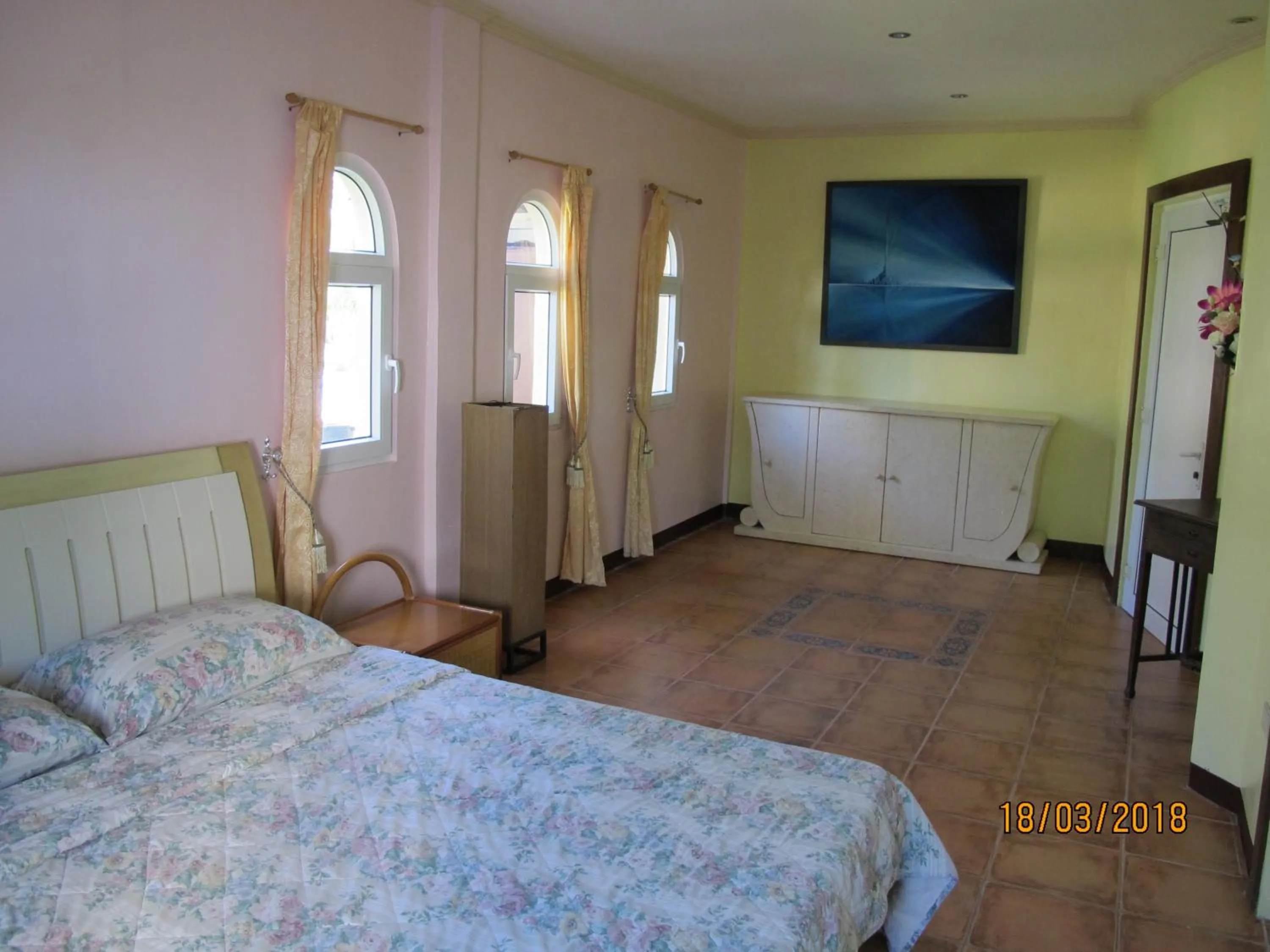 Bed in Cabilao Sunset Dive & Beach Resort