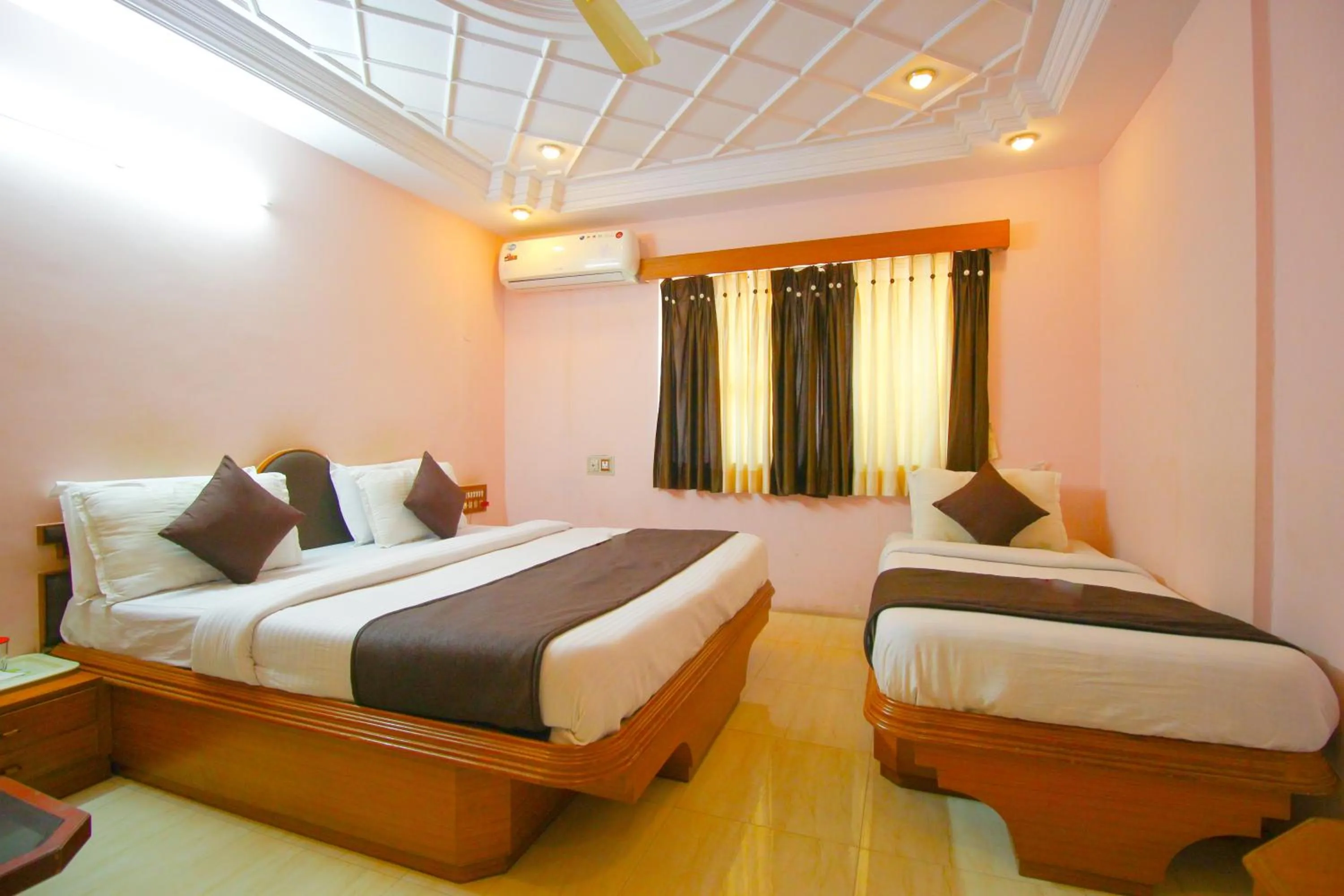 Bed in Hotel Upasana