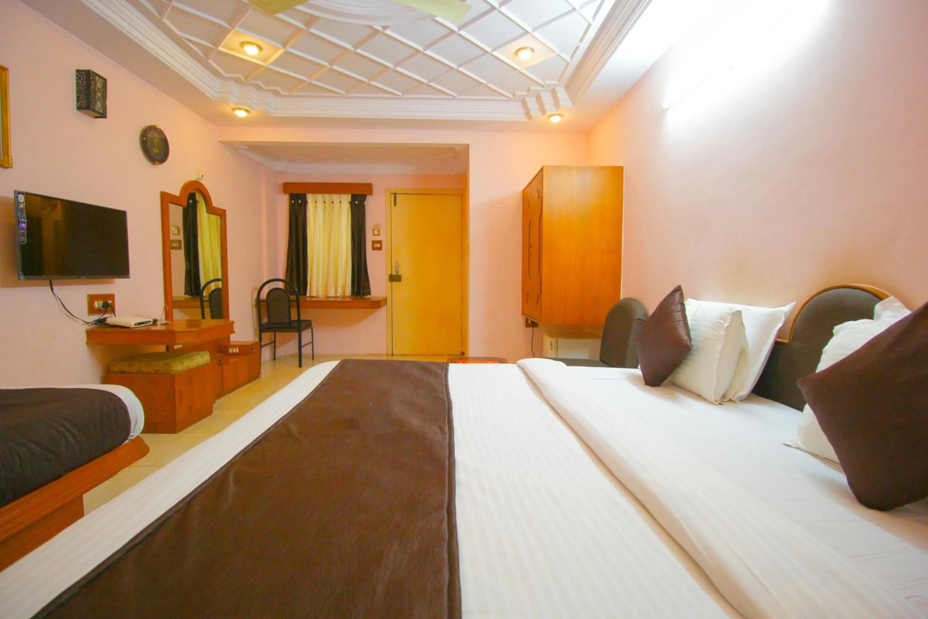 Bed in Hotel Upasana