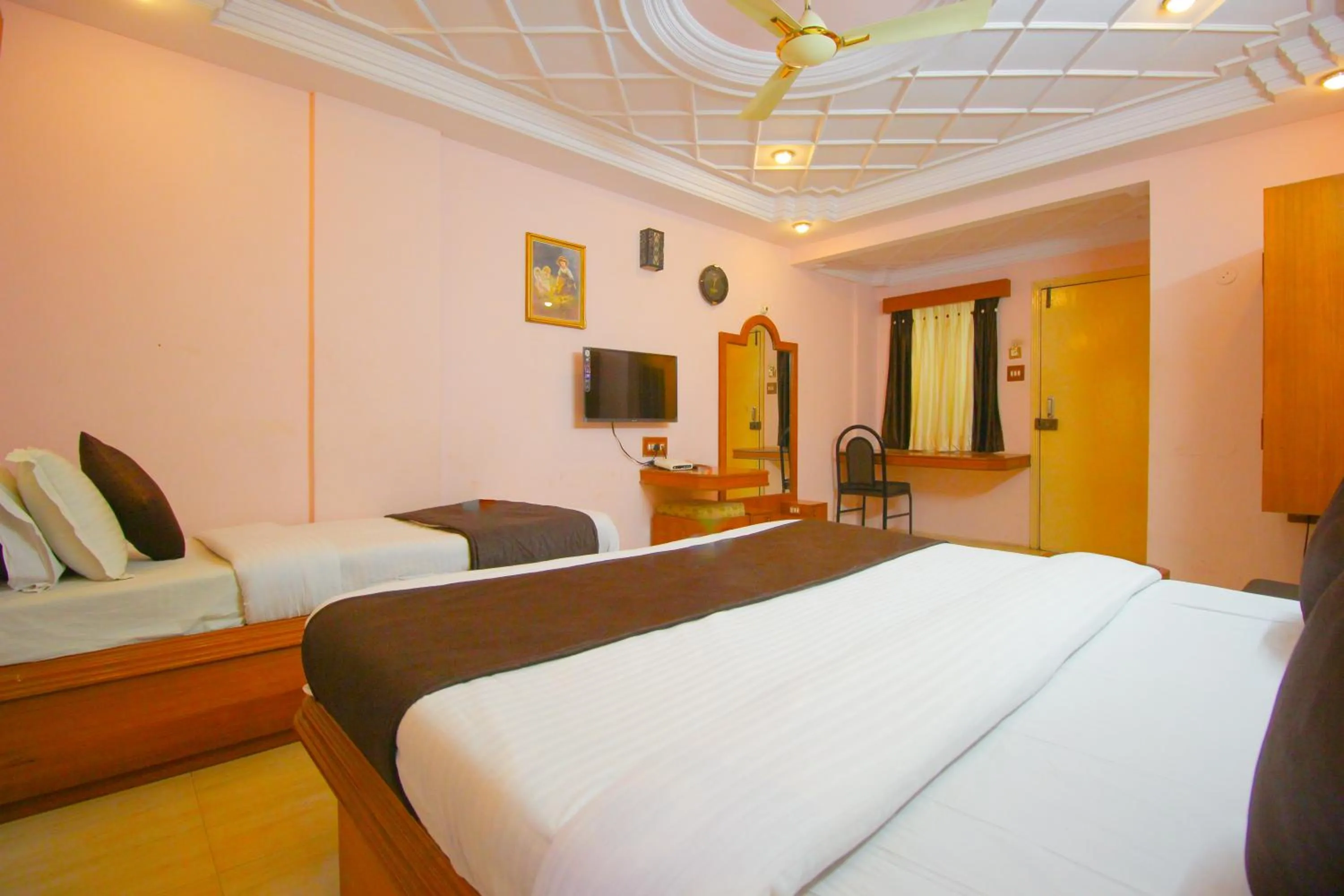Bed in Hotel Upasana