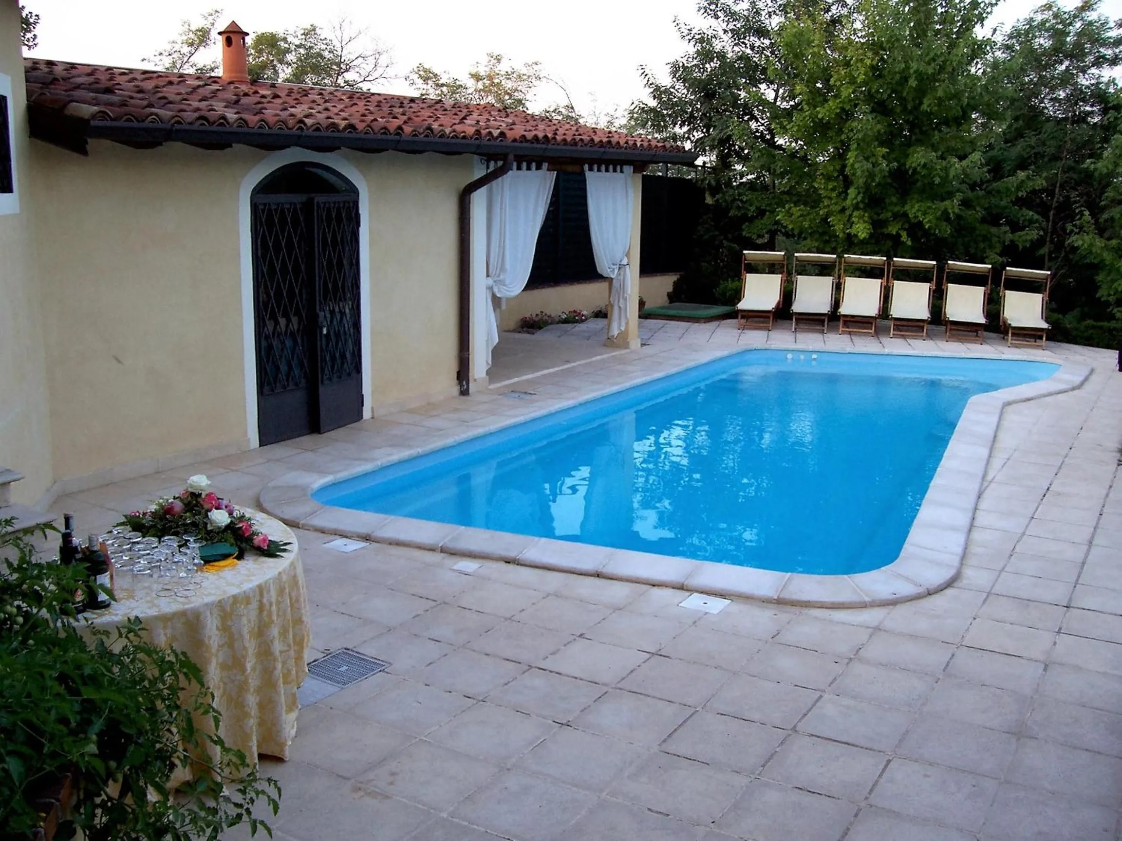 Pool view in Relais Torre Dei Torti - Luxury Bed and Breakfast