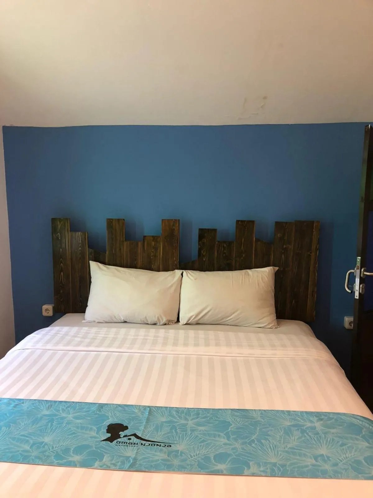 Bed in Omah Njonja Bed & Brasserie