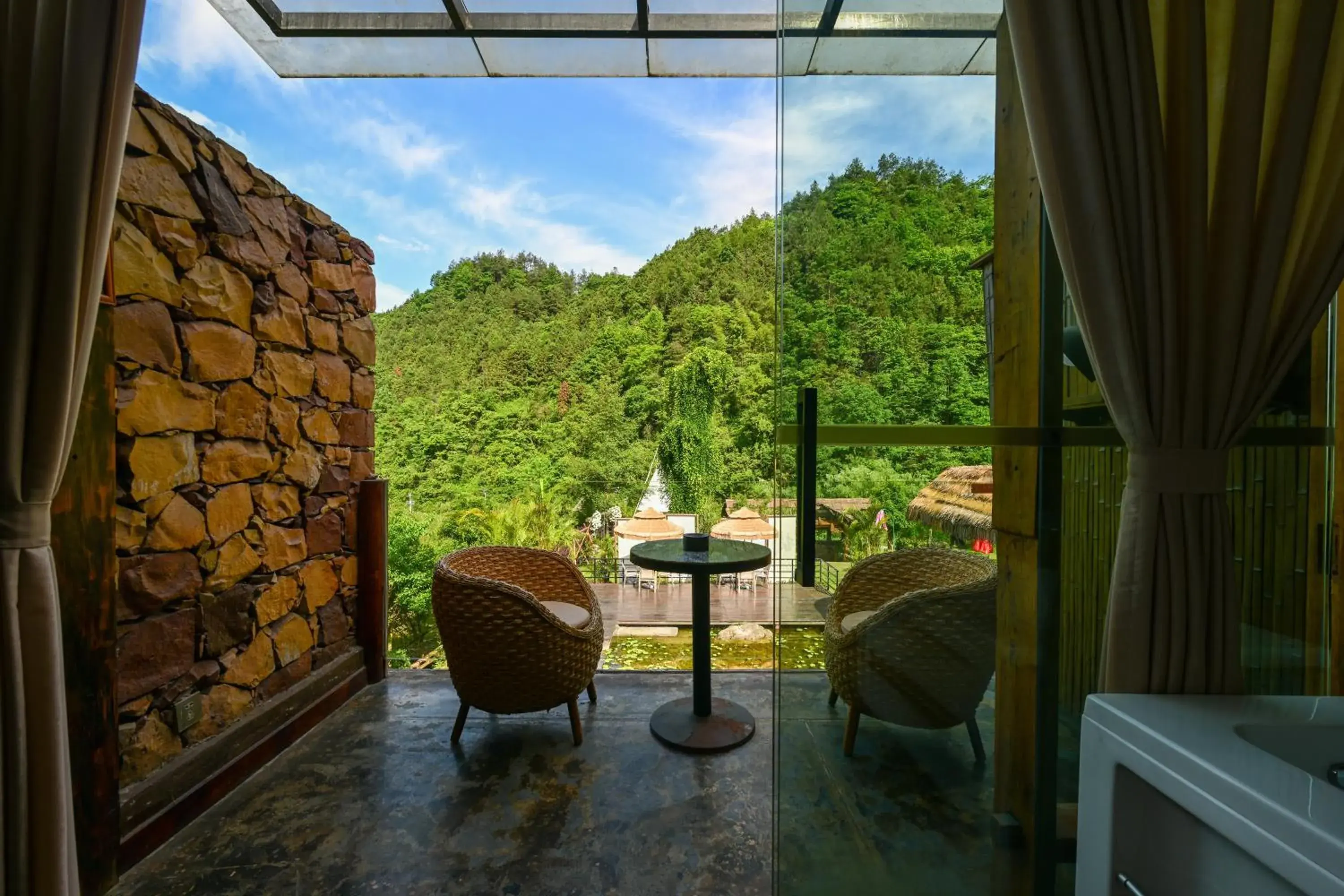 King room with Lotus Pond View , Balcony, Bathtub, and Fireplace in Pandora Vista Retreat King room with Lotus Pond View , Balcony, Bathtub, and Fireplace in Pandora Vista Retreat