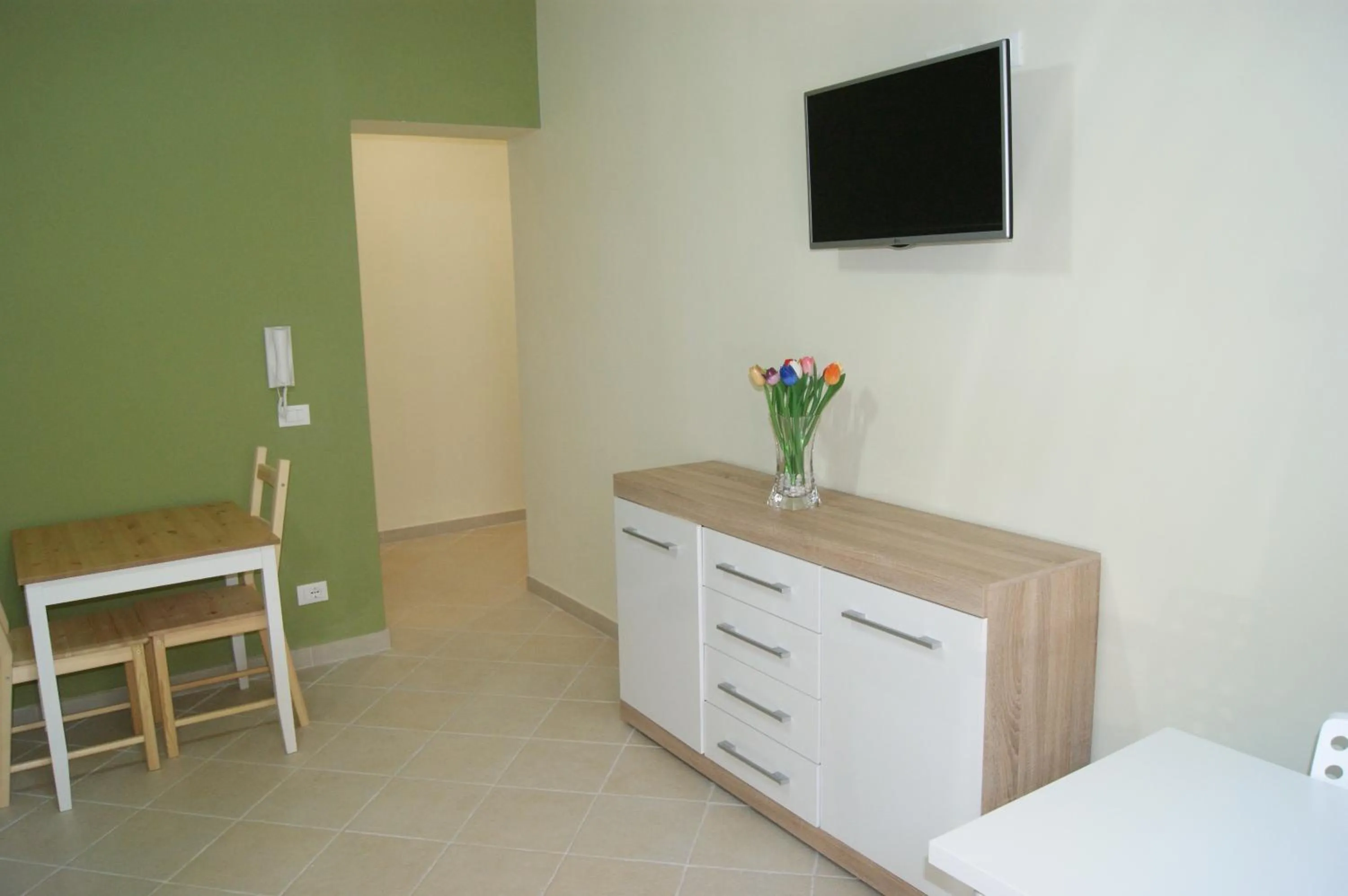 Communal lounge/ TV room in Guest House Golfo Xifonio