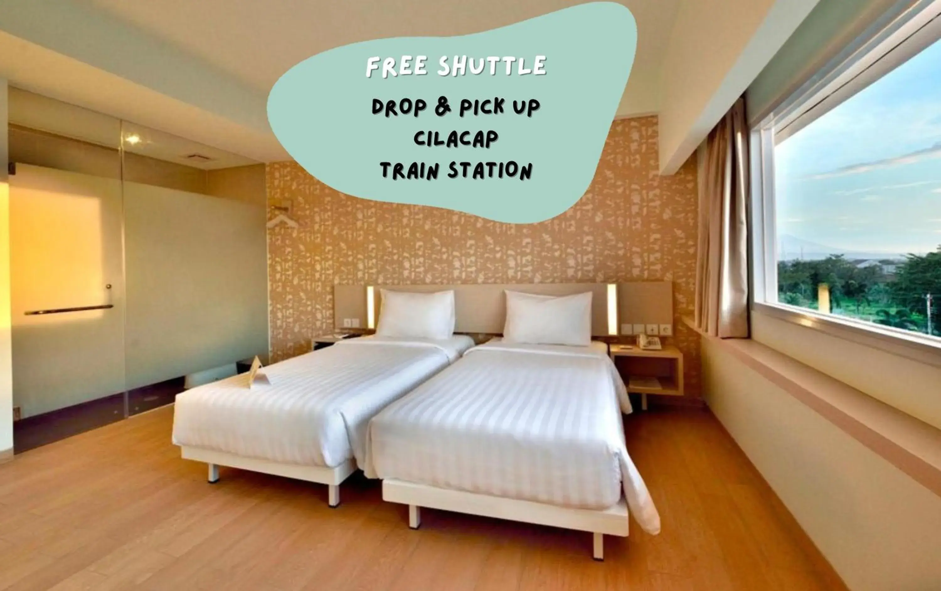 Deluxe Twin Room in Whiz Prime Hotel Sudirman Cilacap Deluxe Twin Room in Whiz Prime Hotel Sudirman Cilacap