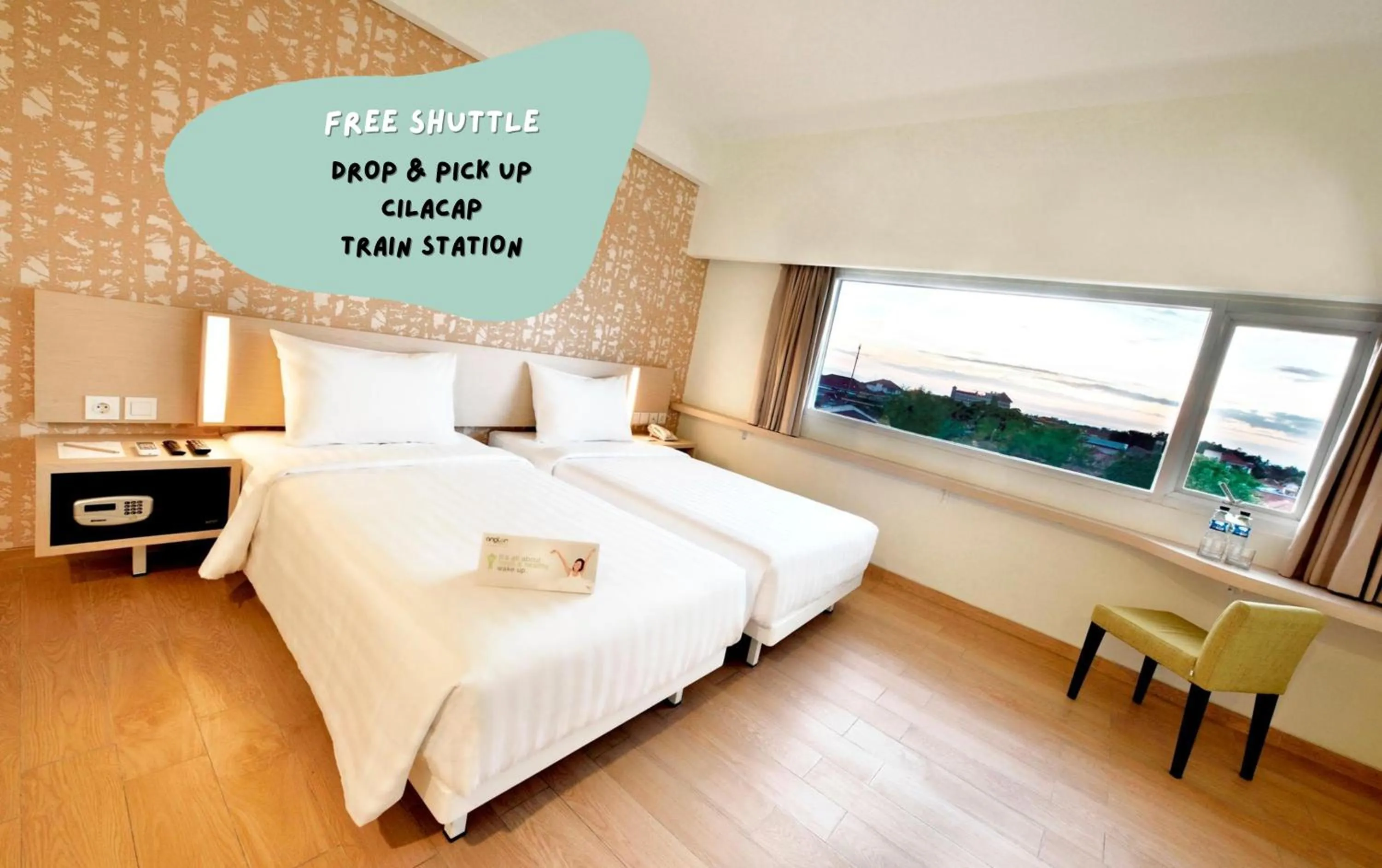 Photo of the whole room, Bed in Whiz Prime Hotel Sudirman Cilacap