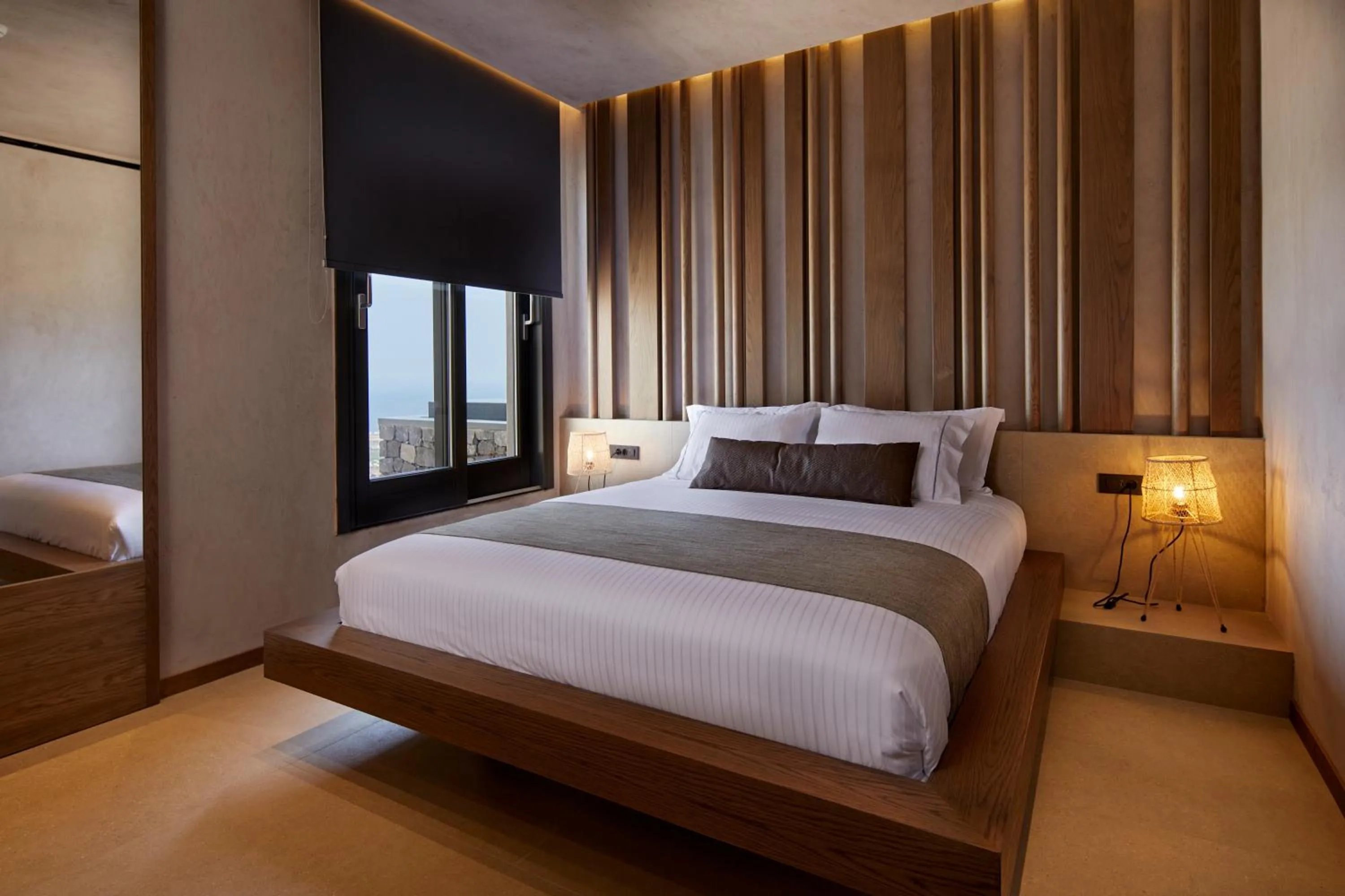 Bed in North Santorini - A Luxury Spa Hotel