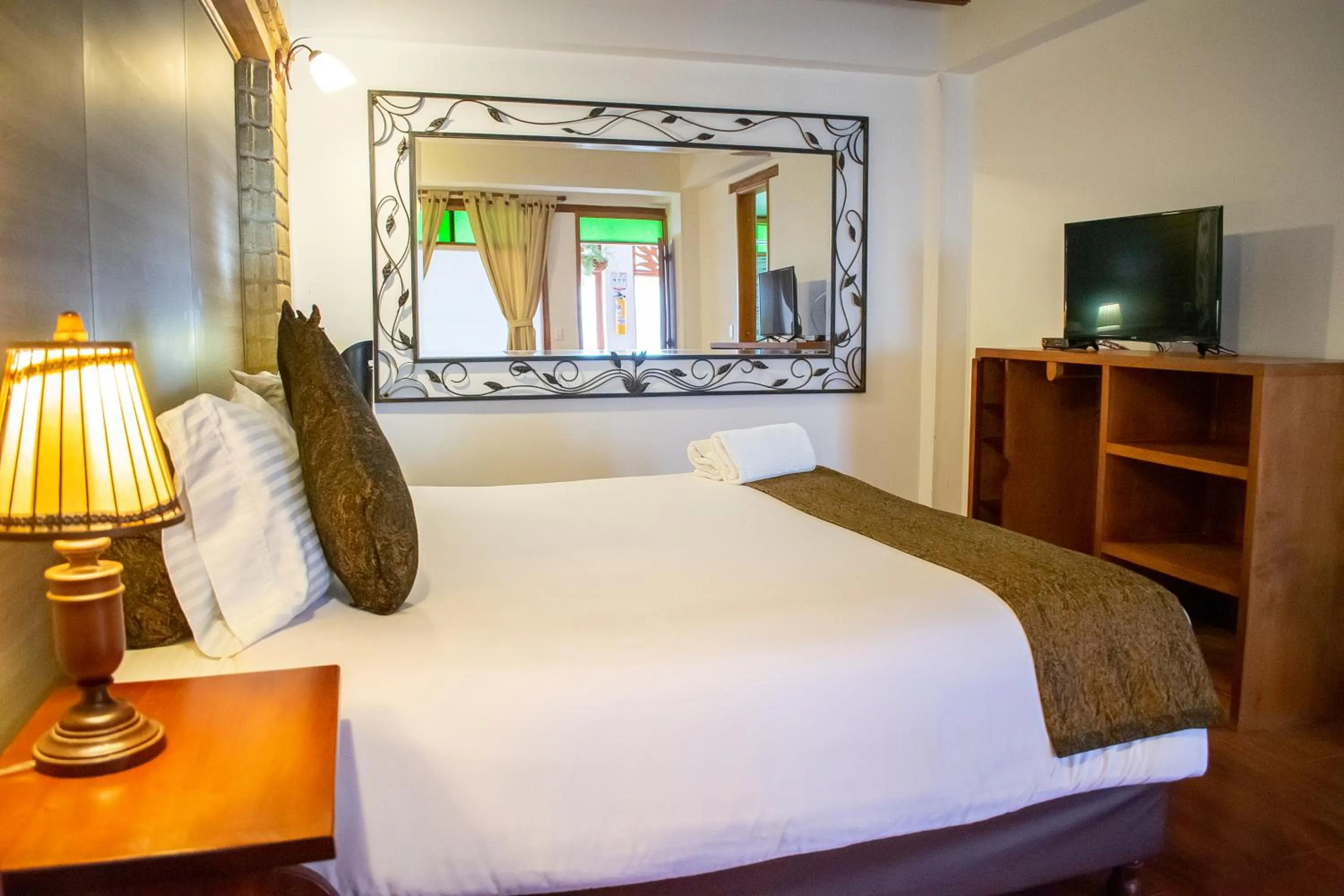 Property building, Bed in Hotel El Giro