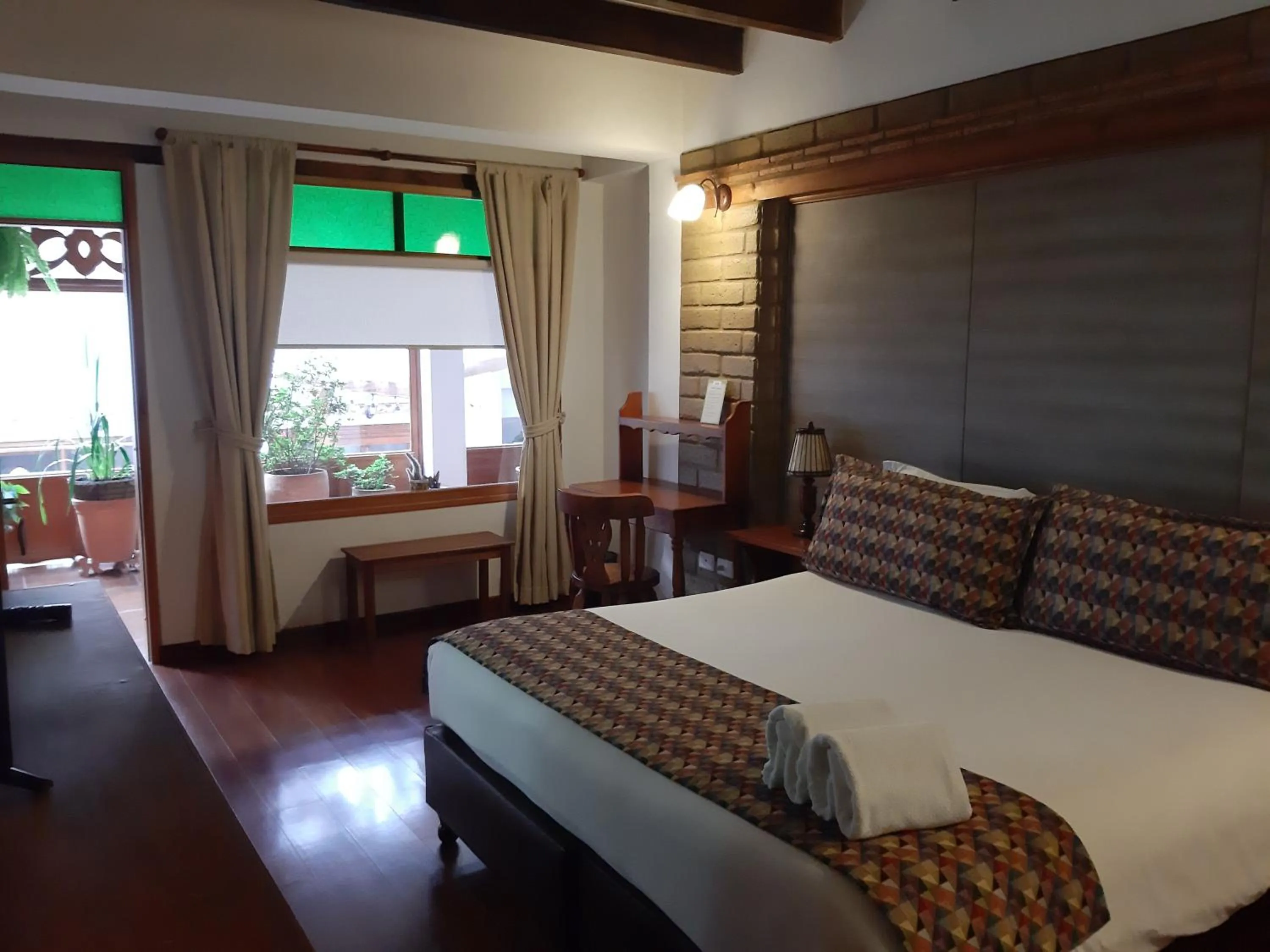 Property building, Bed in Hotel El Giro