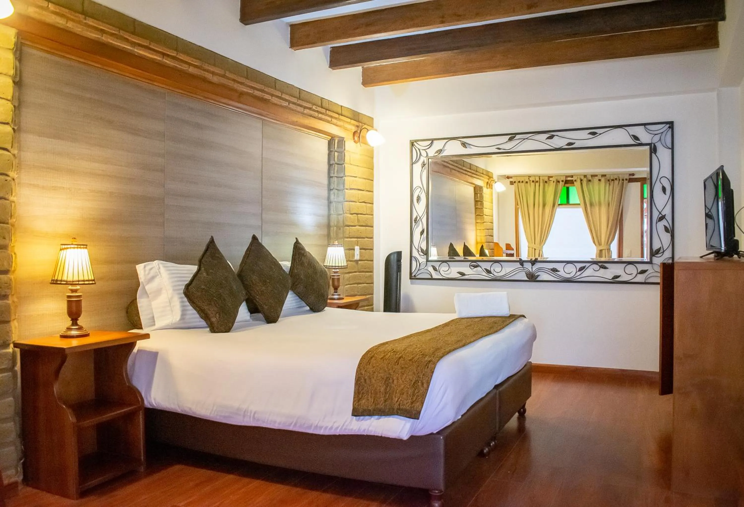Property building, Bed in Hotel El Giro