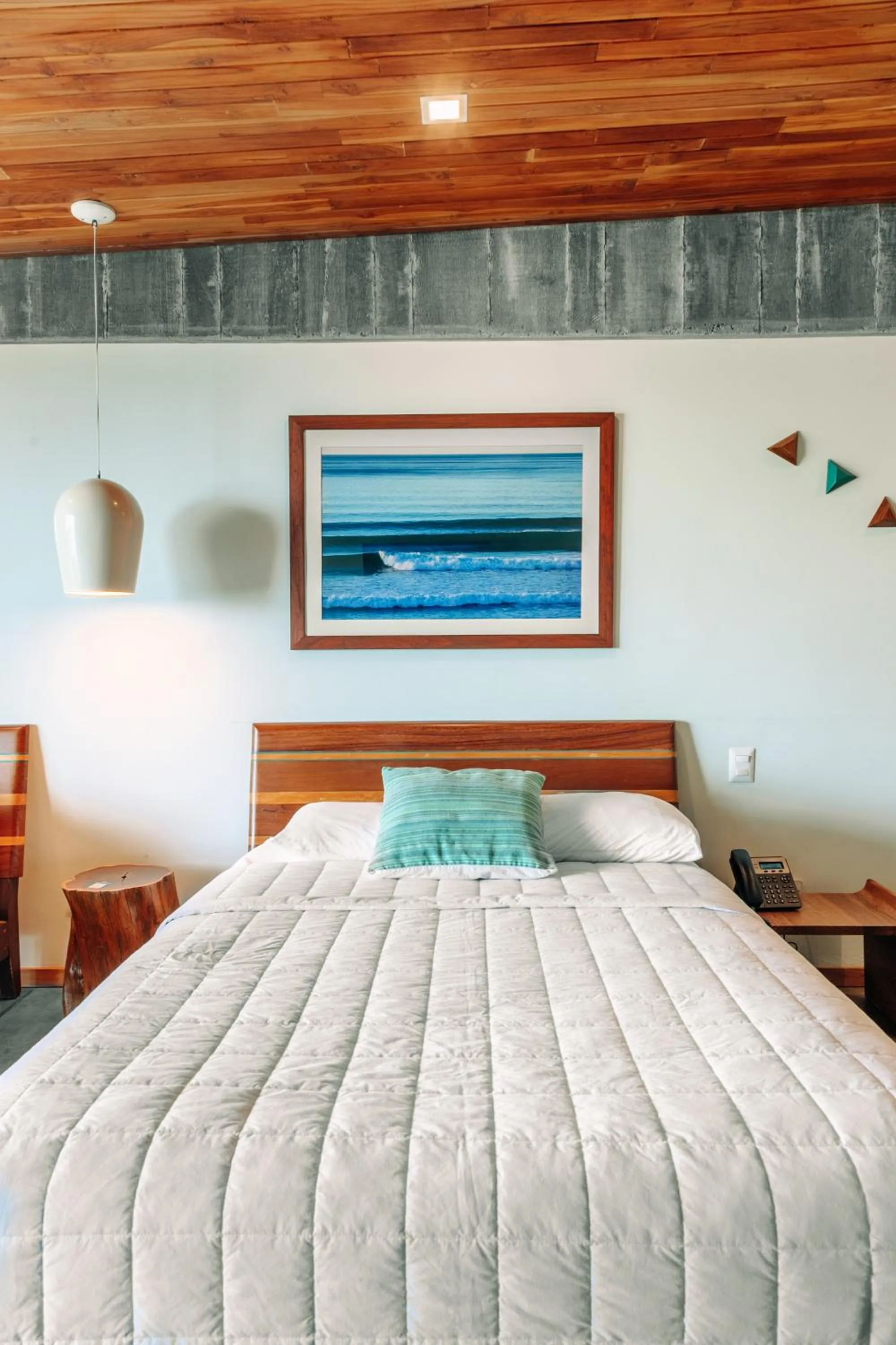 Bed in Puro Surf Hotel & Performance Academy