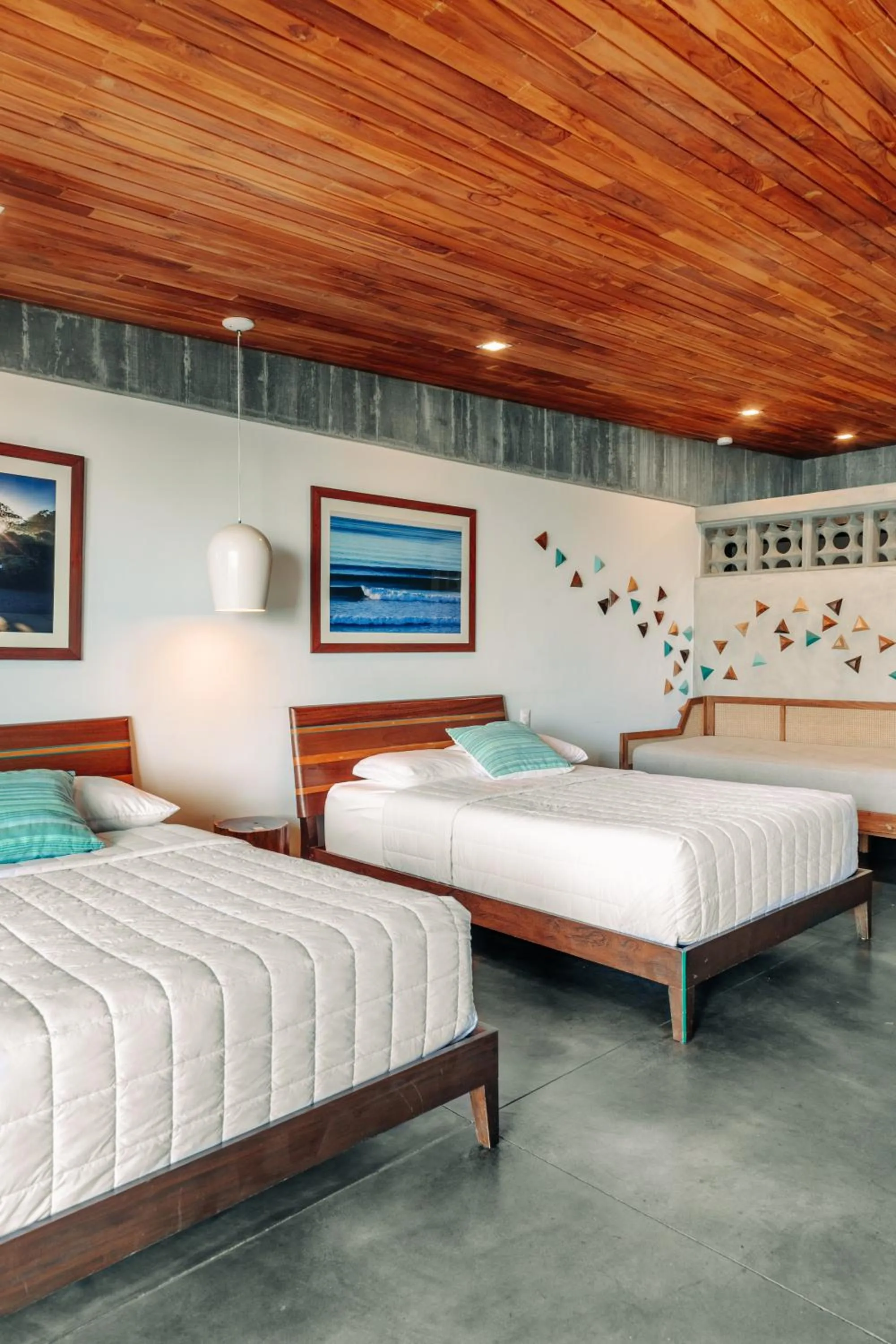 Bed in Puro Surf Hotel & Performance Academy