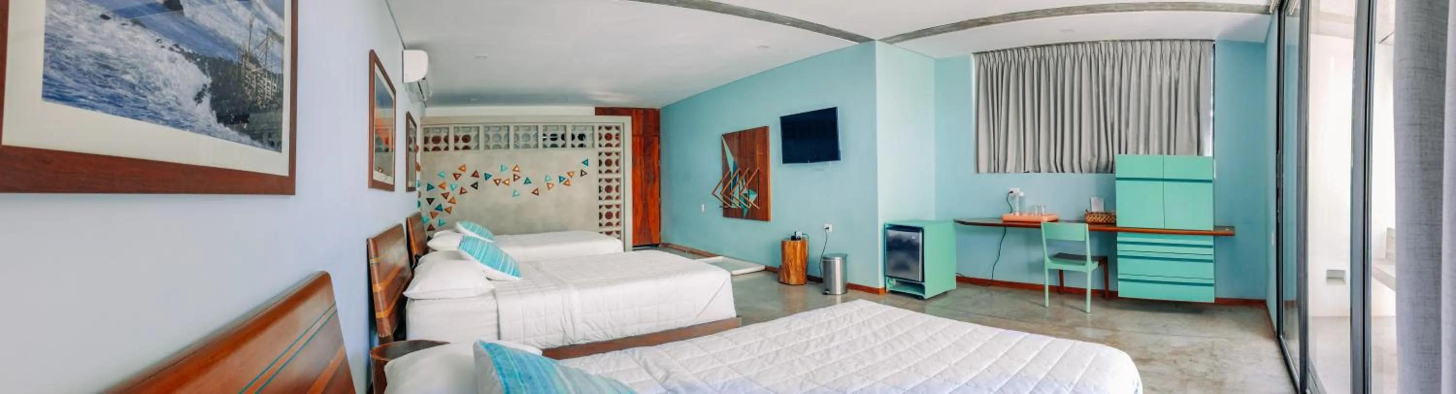 Bed in Puro Surf Hotel & Performance Academy