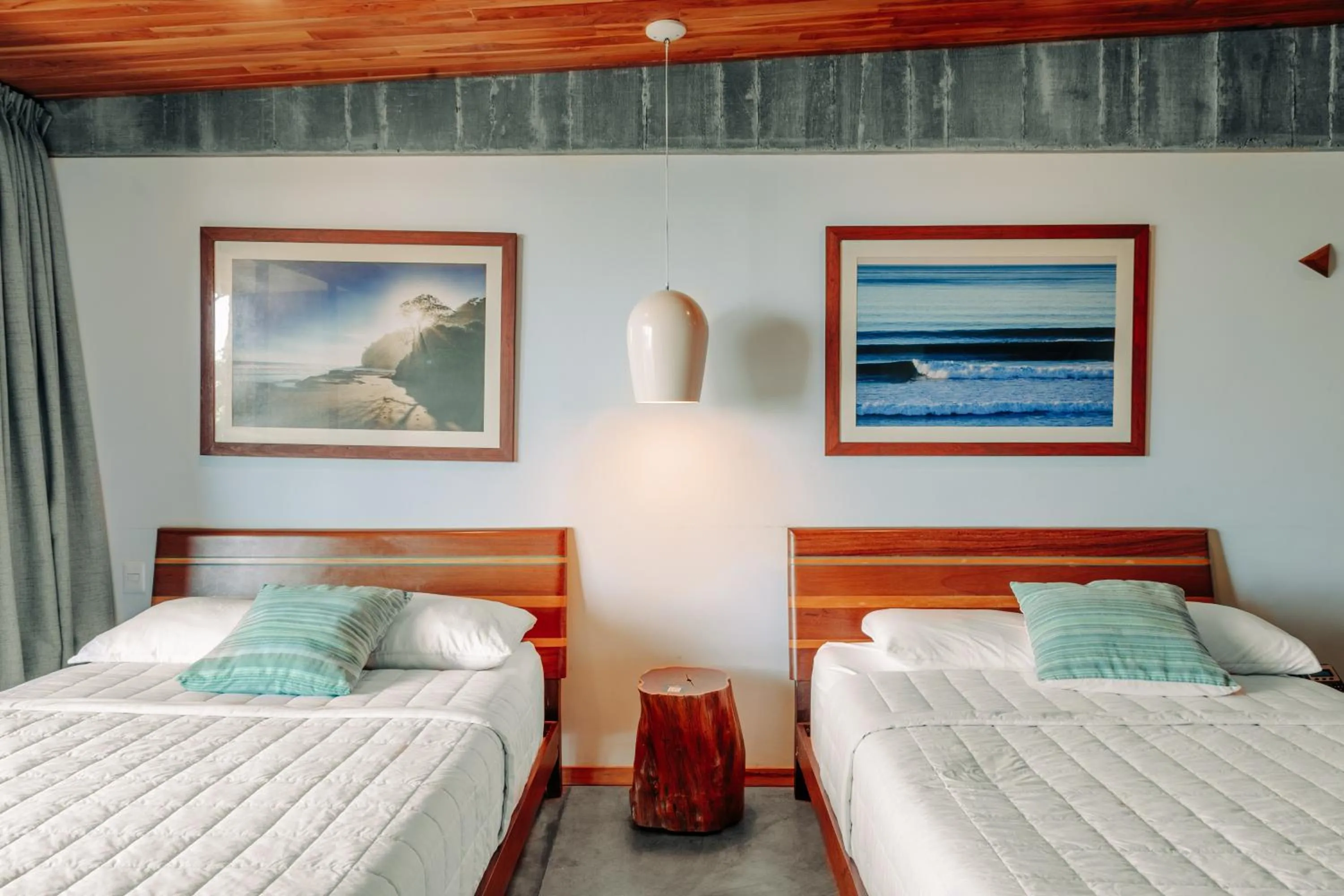 Bed in Puro Surf Hotel & Performance Academy