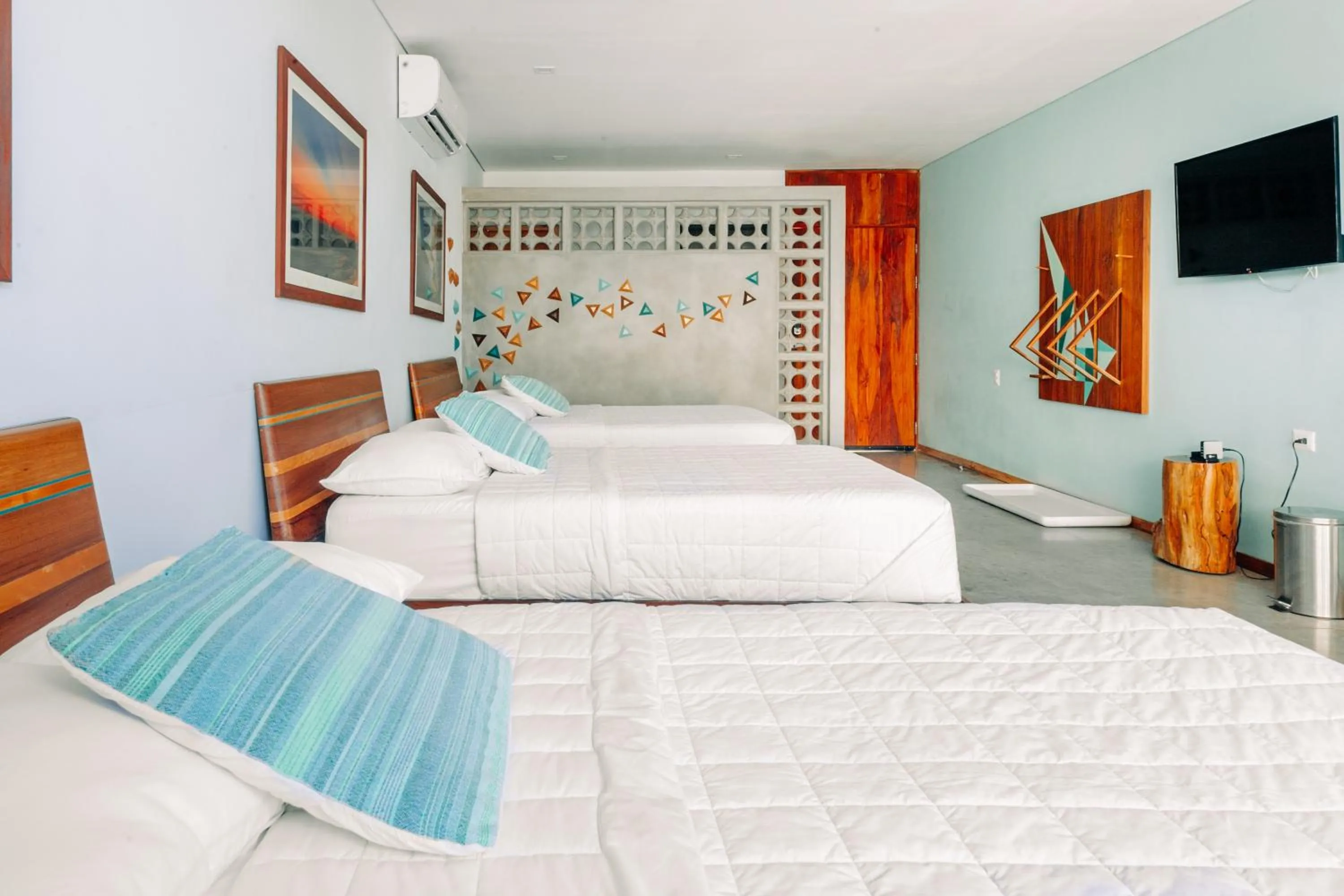 Bed in Puro Surf Hotel & Performance Academy