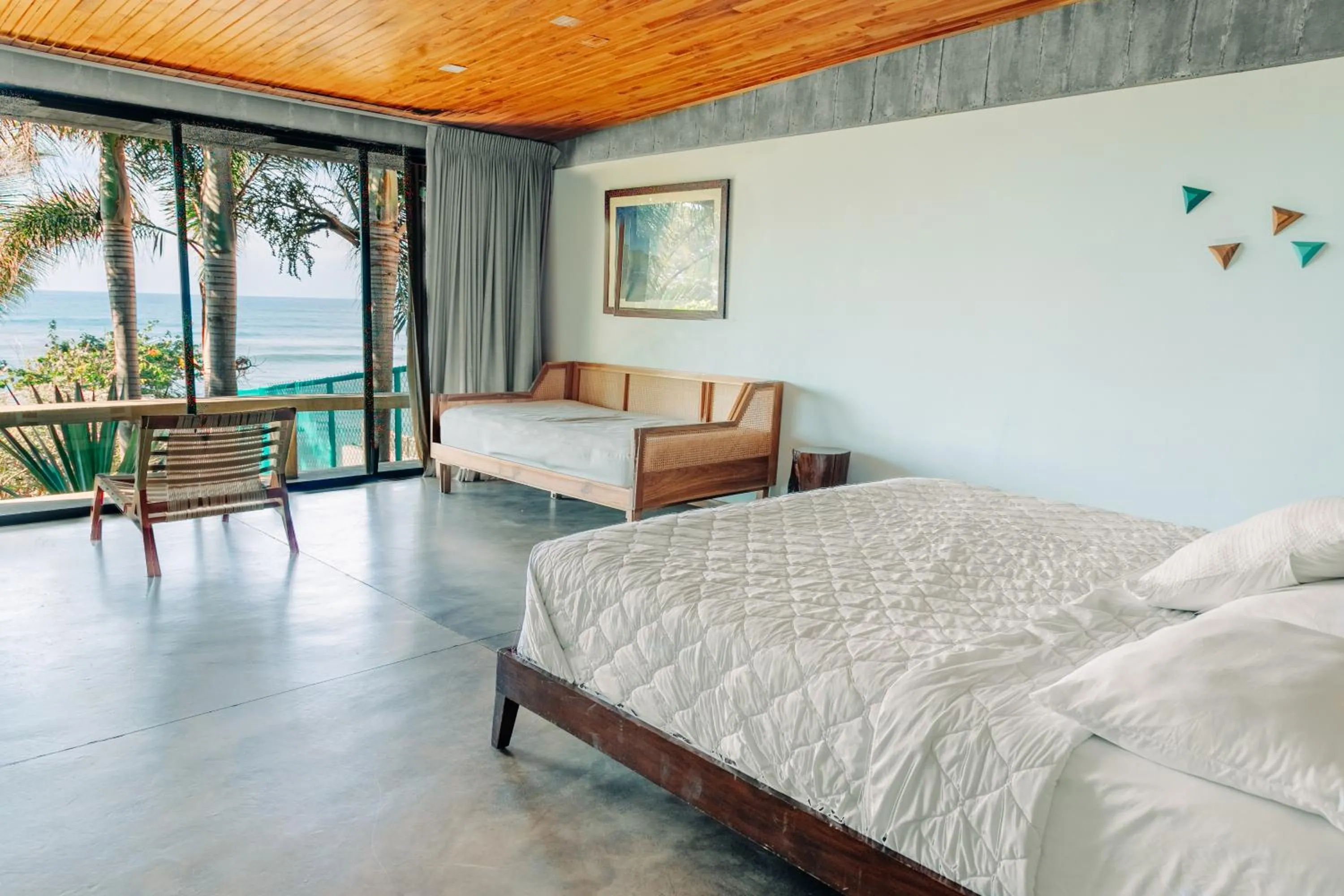 Bed in Puro Surf Hotel & Performance Academy