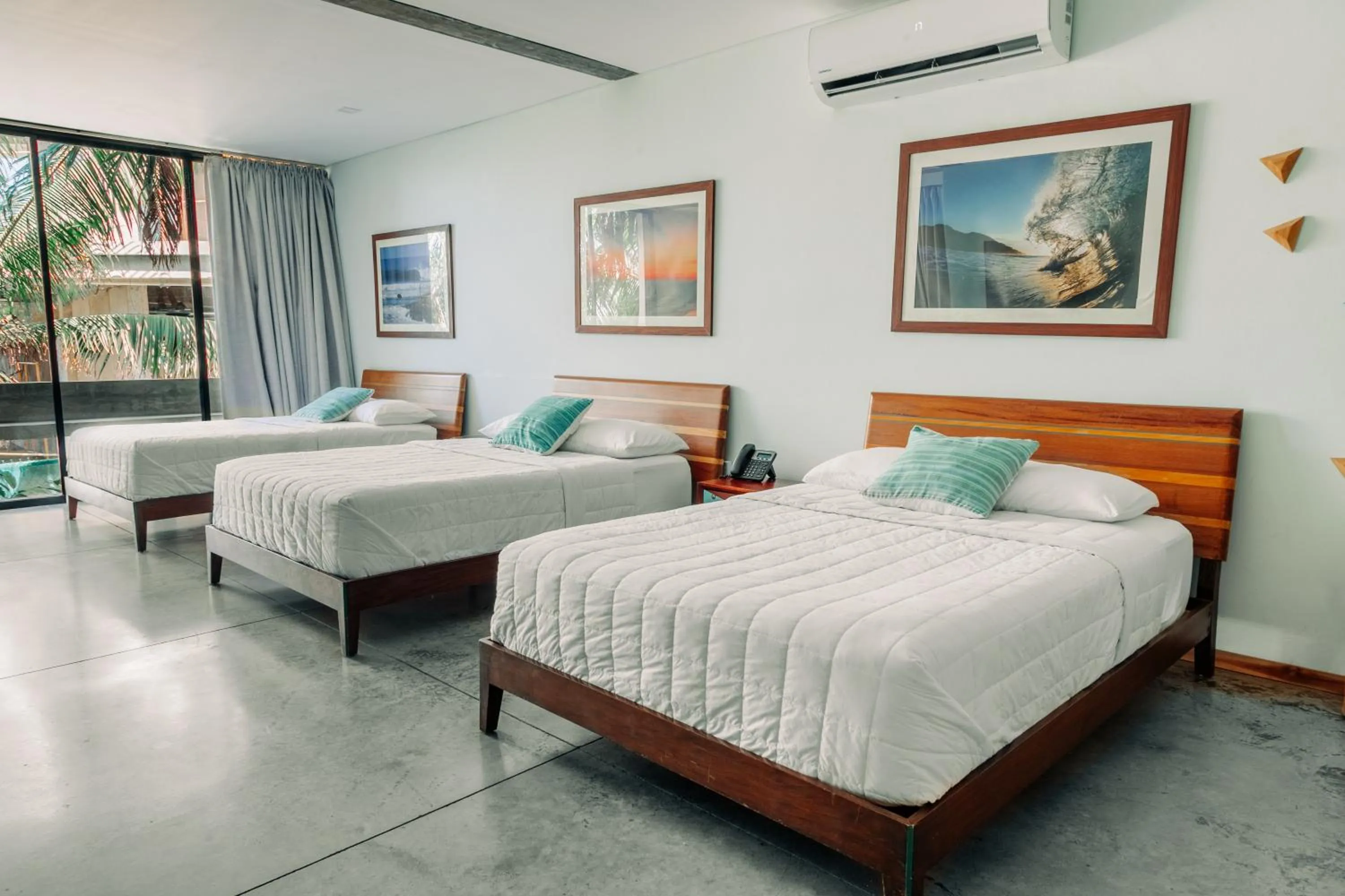 Bed in Puro Surf Hotel & Performance Academy